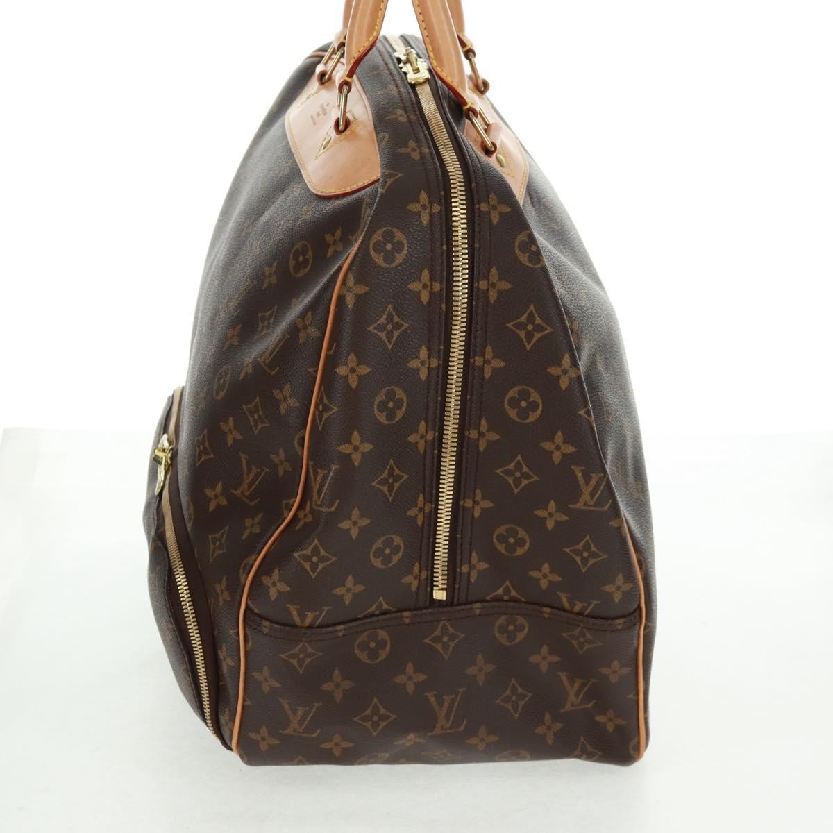 Louis Vuitton Evasion Monogram Canvas Brown Canvas Travel Bag Bag (Pre-Owned)