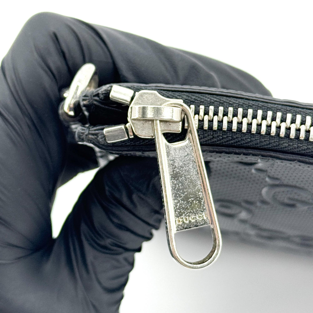 Gucci Wristlet Gg Embossed Perforated Leather Black Leather Clutche & Pouche Bag (Pre-Owned)