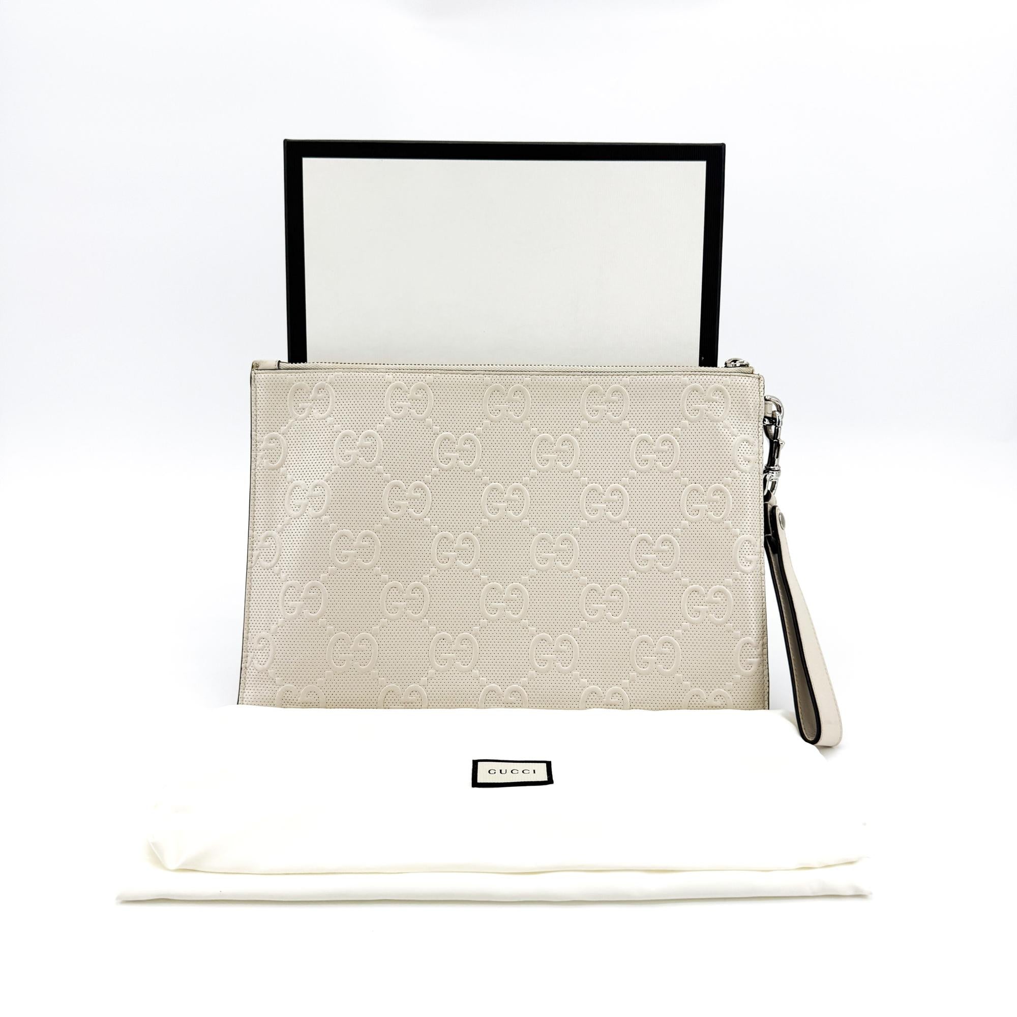 Gucci Wristlet Gg Embossed Perforated Leather White Leather Clutche & Pouche Bag (Pre-Owned)
