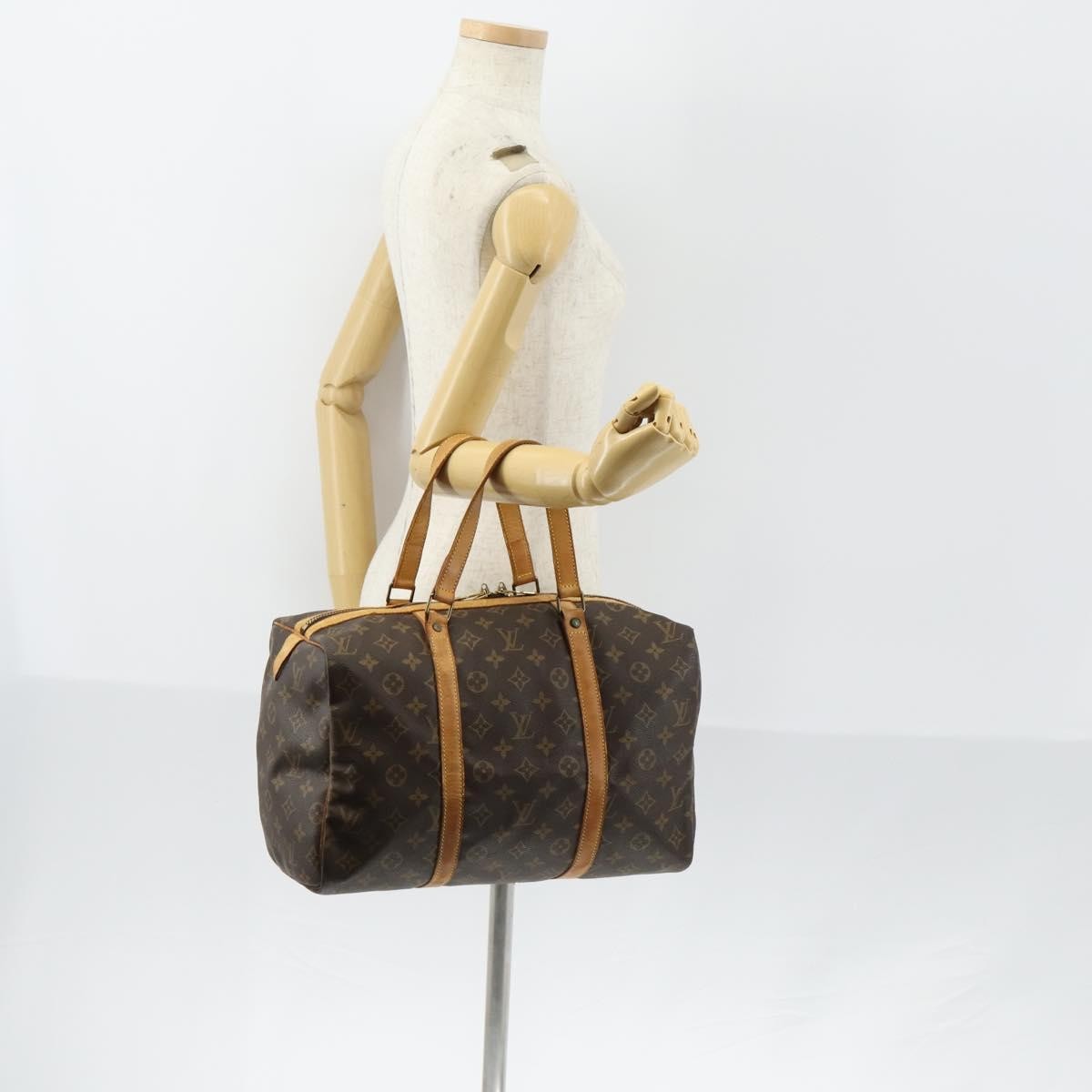 Louis Vuitton Sac Souple Monogram Canvas Brown Canvas Travel Bag Bag (Pre-Owned)