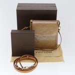 Louis Vuitton Mott Beige Patent Leather Clutch Bag (Pre-Owned)