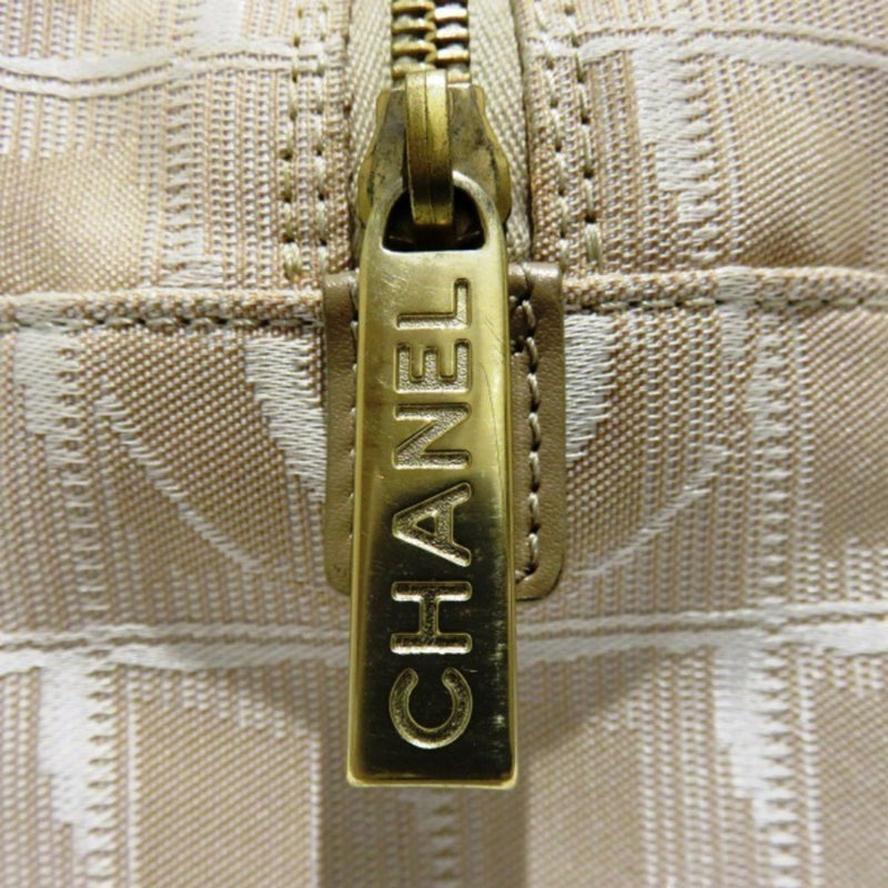 Chanel Travel Line Beige Canvas Handbag (Pre-Owned)