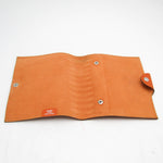 Hermès Ulysse Orange Leather Wallet  (Pre-Owned)
