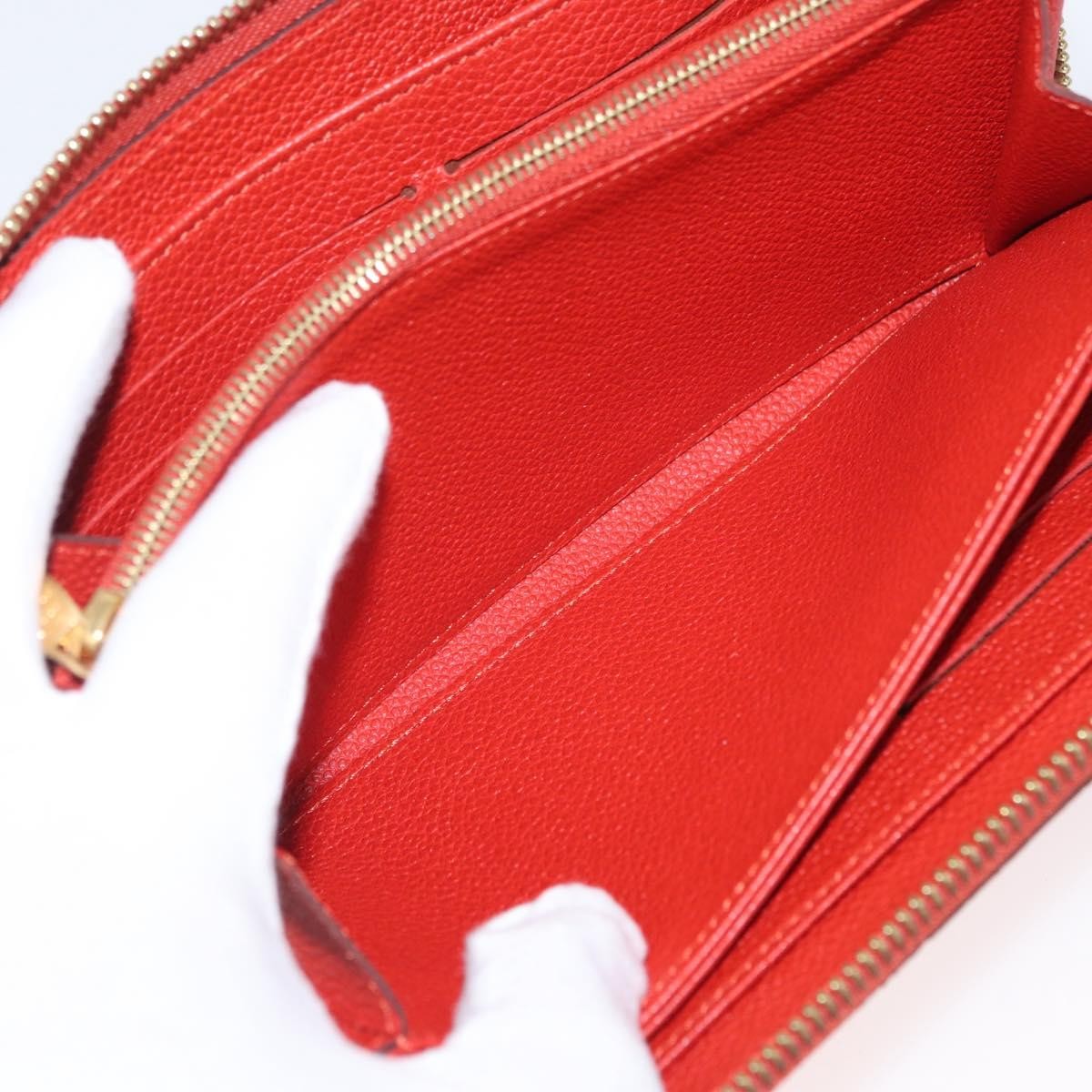 Louis Vuitton Portefeuille Zippy Monogramme Empreinte Monogramme Empreinte Orange Leather Wallets Accessory (Pre-Owned)