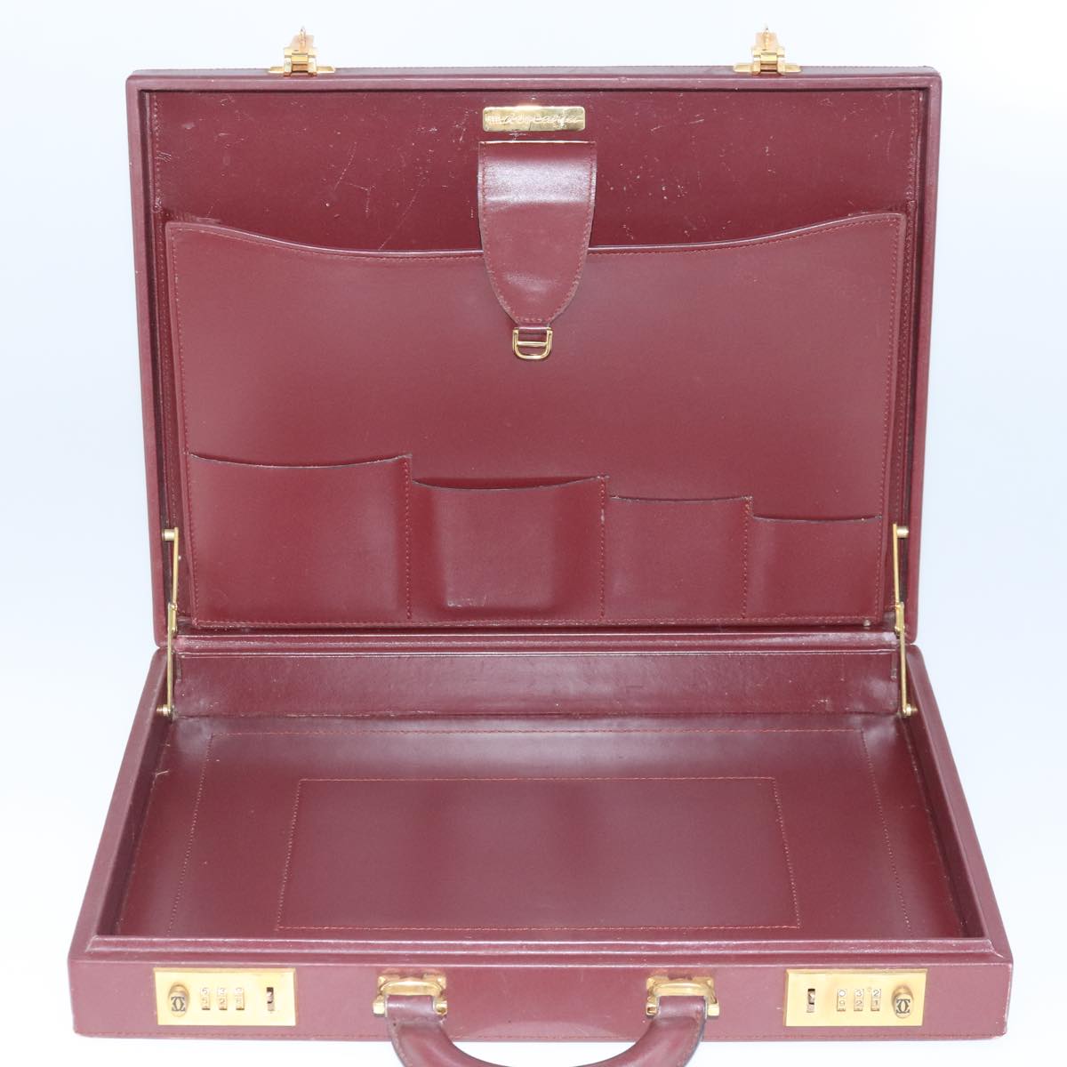 Cartier Must De Cartier Burgundy Leather Travel Bag (Pre-Owned)