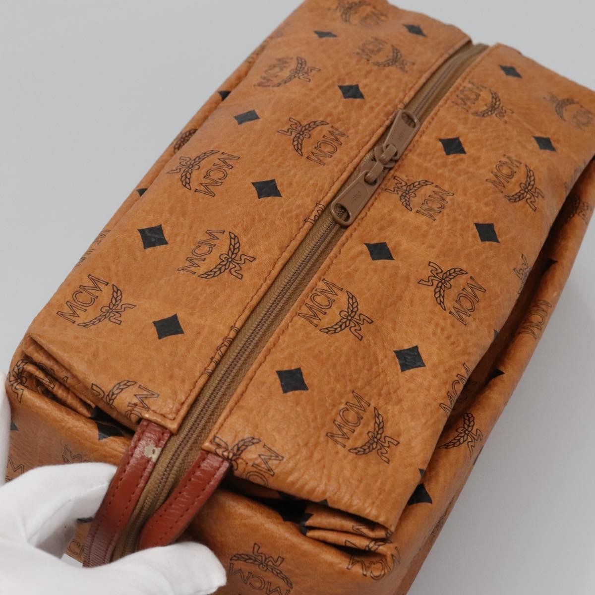 MCM Visetos Pvc Brown Pvc Clutche & Pouche Bag (Pre-Owned)