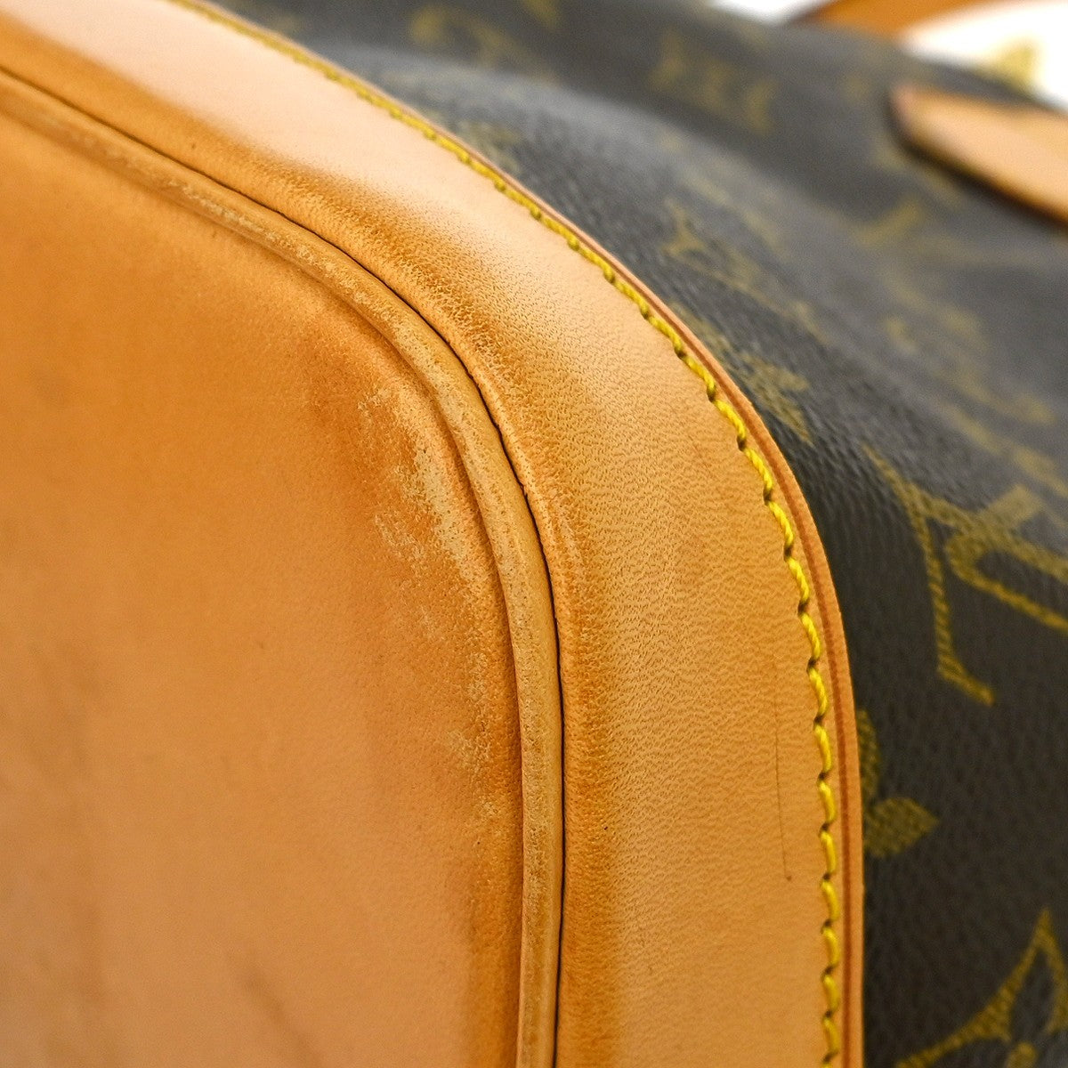 Louis Vuitton Alma Monogram Brown Canvas Handbag (Pre-Owned)