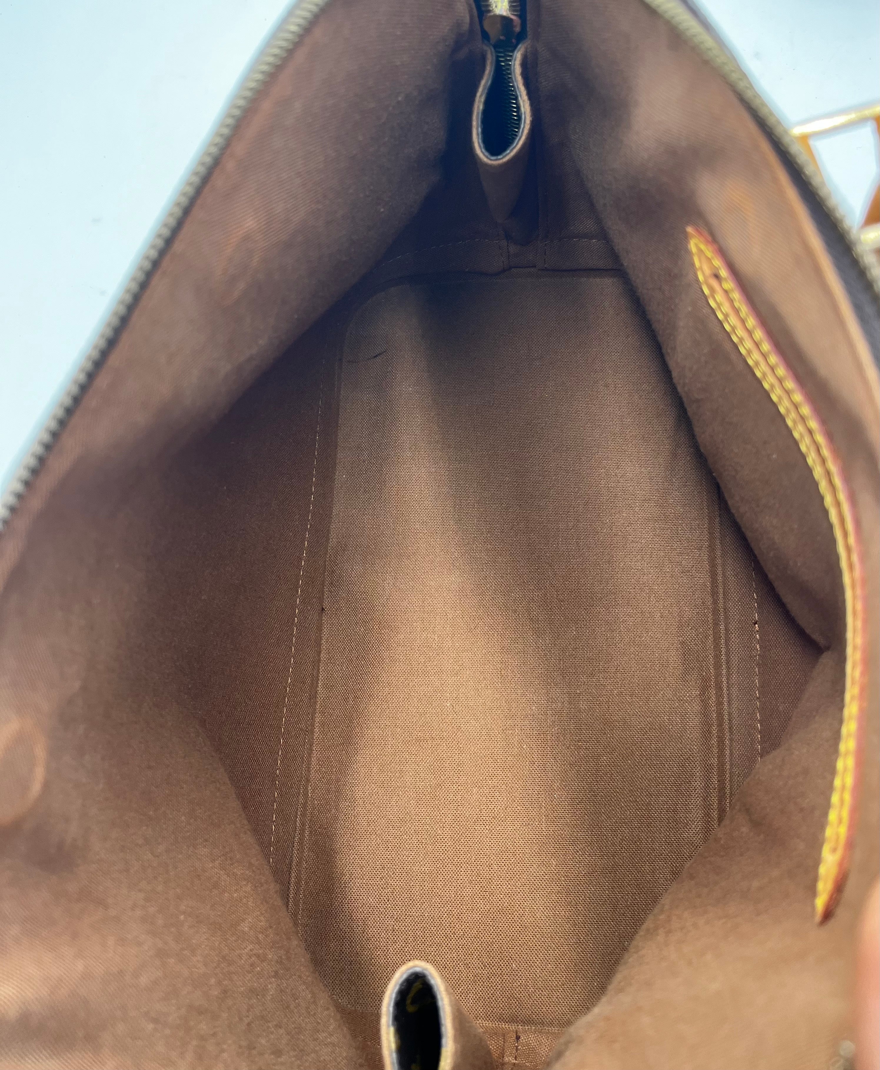Louis Vuitton Alma Handbag Monogram Canvas Brown Canvas Handbag (Pre-Owned)