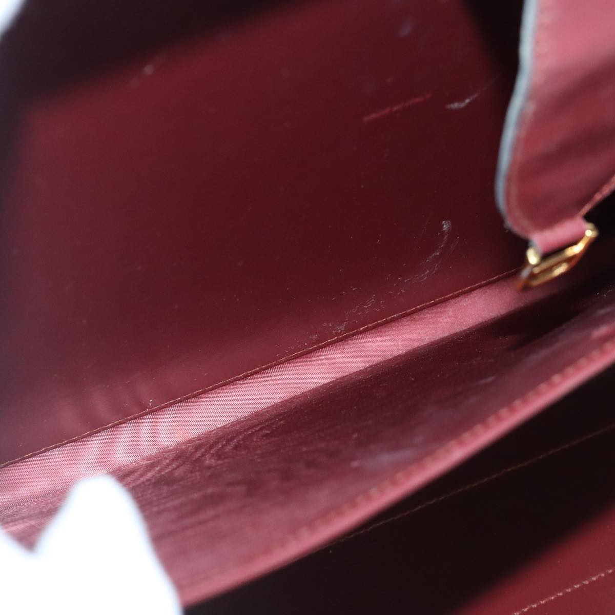 Cartier Must De Cartier Burgundy Leather Travel Bag (Pre-Owned)
