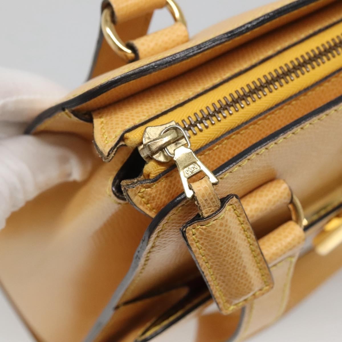 Celine Vintage Turnlock Leather Yellow Leather Handbag (Pre-Owned)