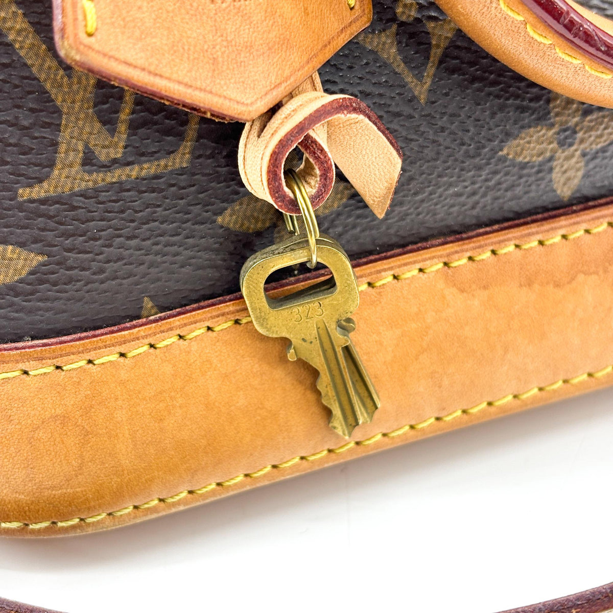 Louis Vuitton Alma Monogram Canvas Brown Canvas Handbag (Pre-Owned)