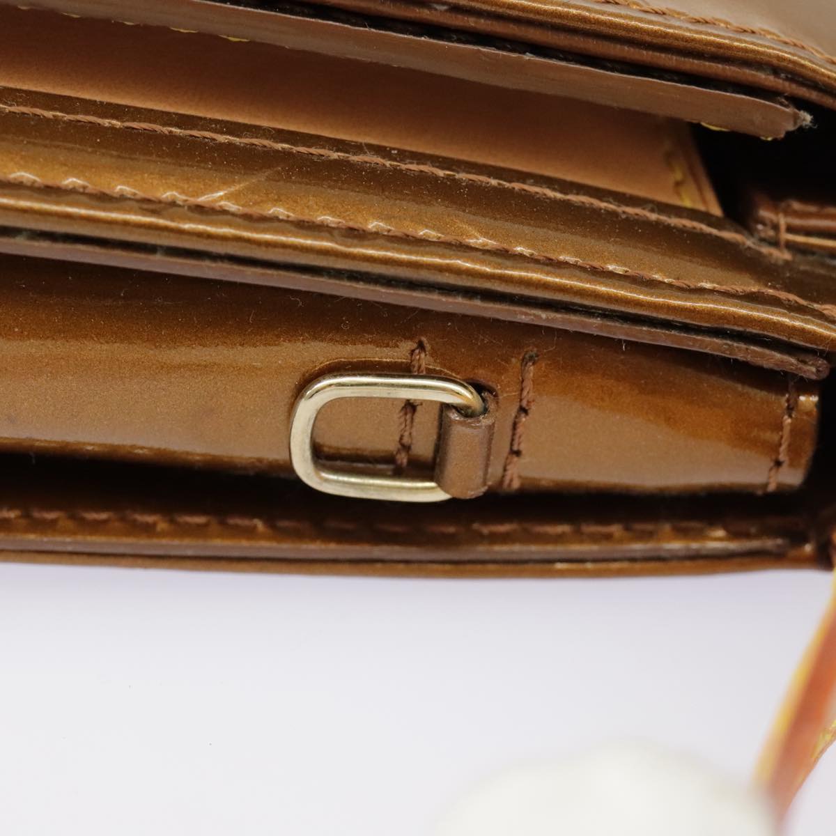 Louis Vuitton Mott Brown Patent Leather Clutch Bag (Pre-Owned)