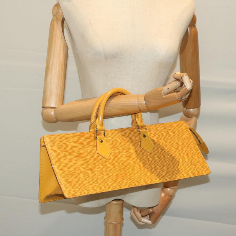 Louis Vuitton Triangle Yellow Leather Handbag (Pre-Owned)