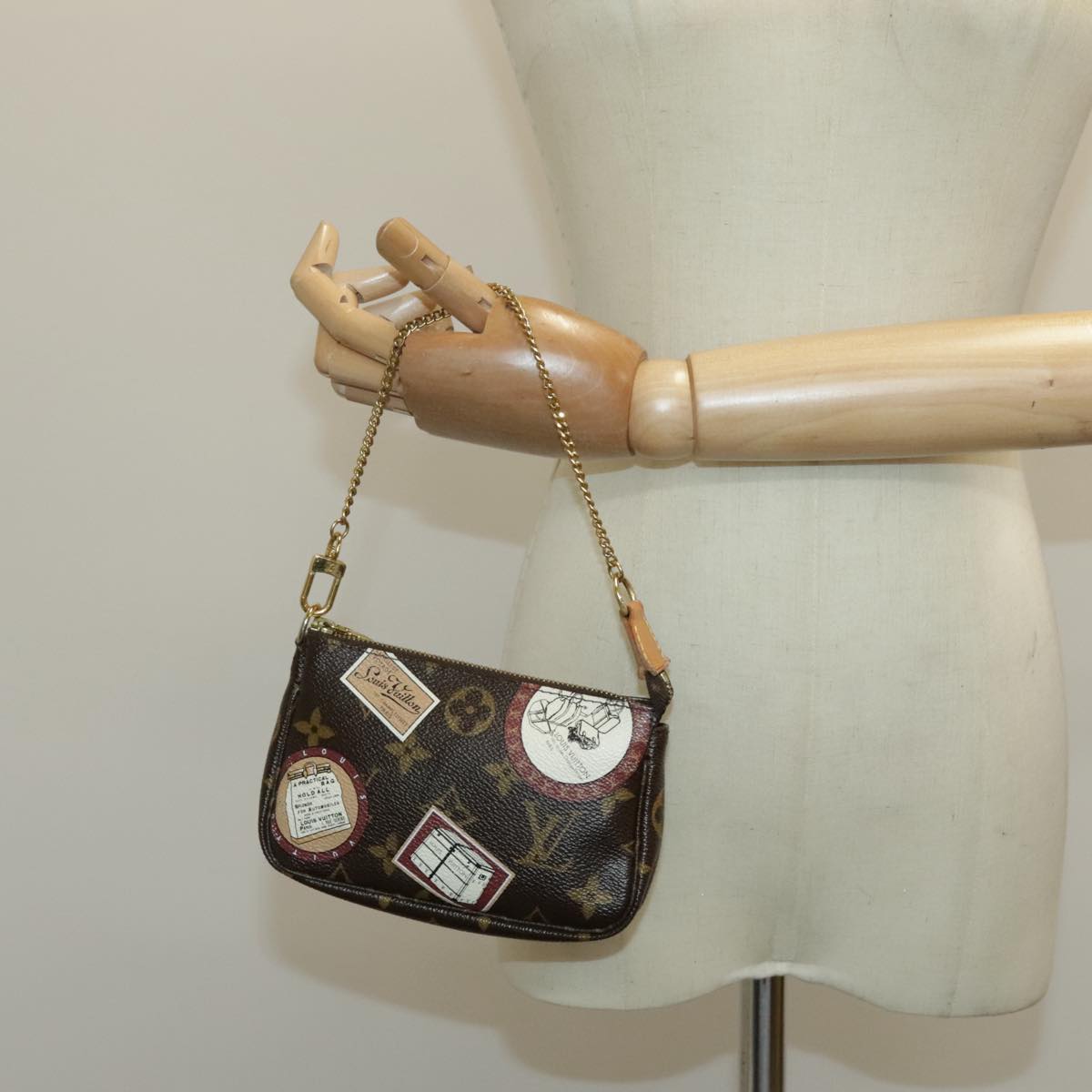 Louis Vuitton Pochette Accessoire Brown Canvas Clutch Bag (Pre-Owned)