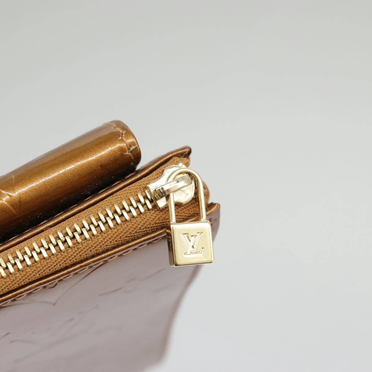Louis Vuitton Mott Brown Patent Leather Clutch Bag (Pre-Owned)