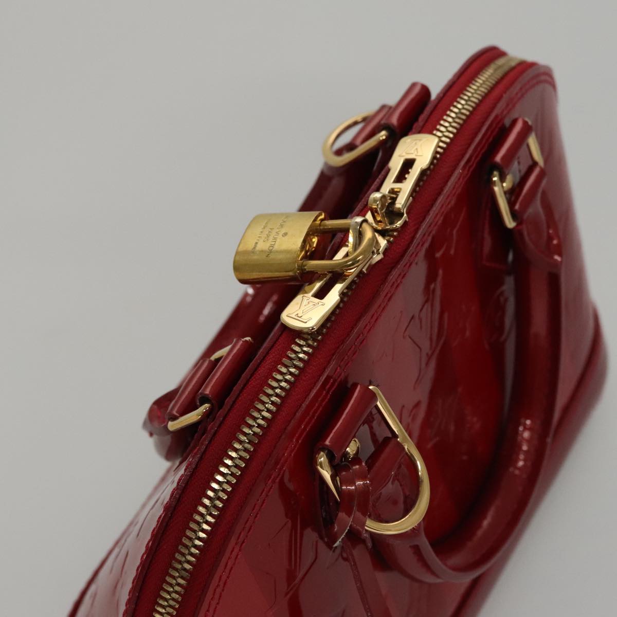 Louis Vuitton Alma Red Patent Leather Handbag (Pre-Owned)