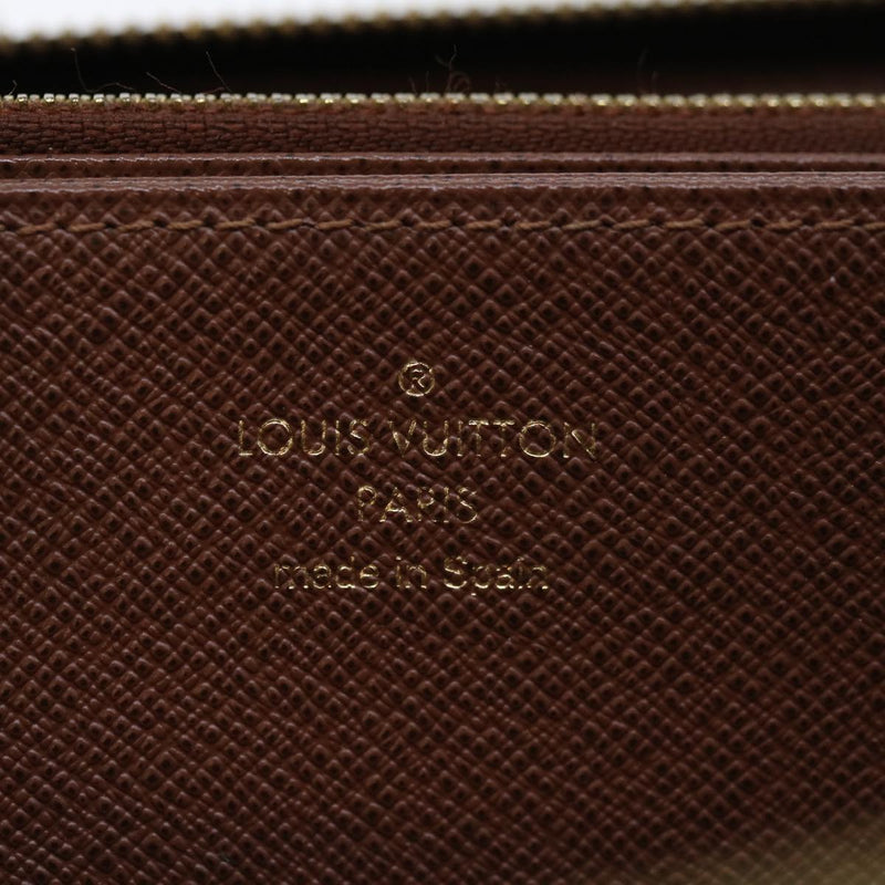 Louis Vuitton Portefeuille Zippy Brown Canvas Wallet  (Pre-Owned)
