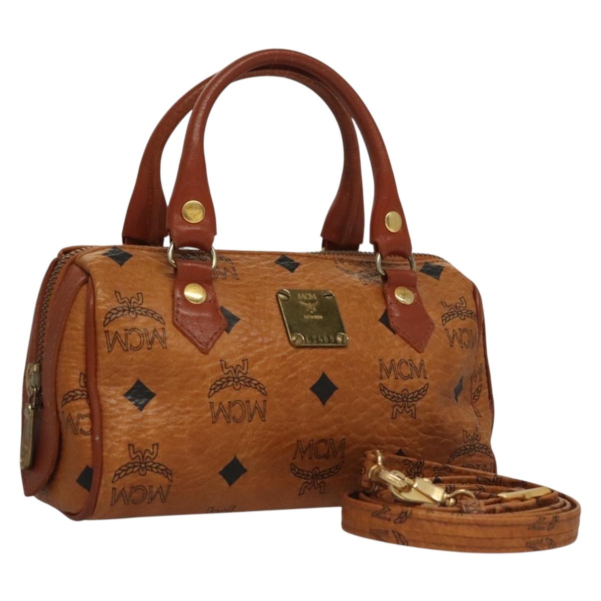 MCM Visetos Brown,Gold Canvas, Leather Travel Bag (Pre-Owned)