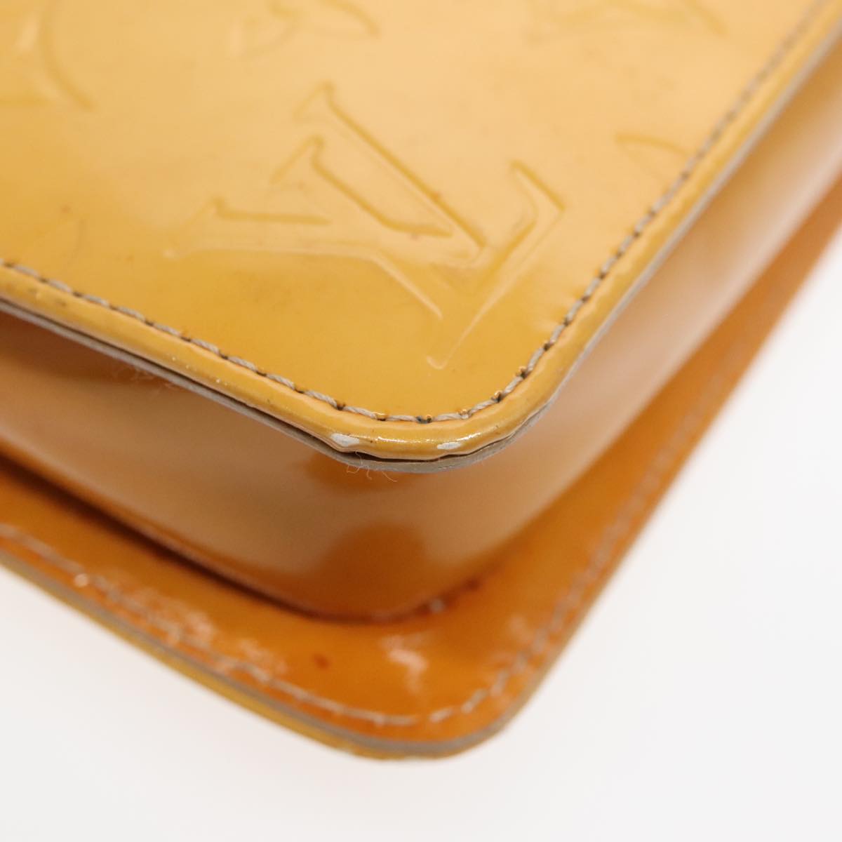 Louis Vuitton Lexington Beige Patent Leather Clutch Bag (Pre-Owned)