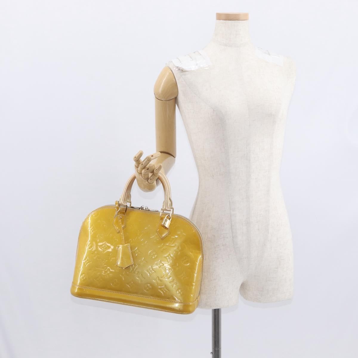 Louis Vuitton Alma Patent Leather Yellow Patent_Leather Handbag (Pre-Owned)