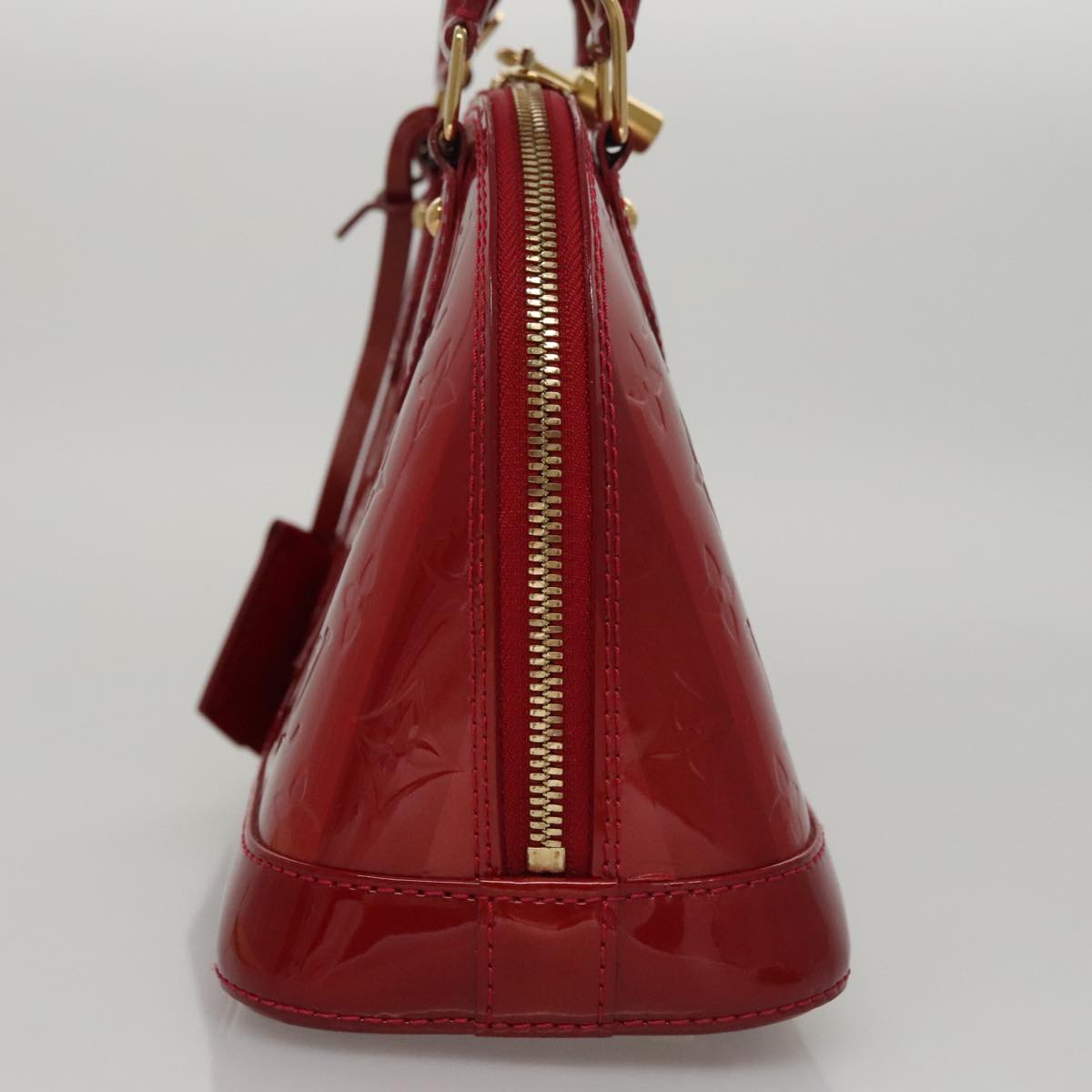Louis Vuitton Alma Red Patent Leather Handbag (Pre-Owned)