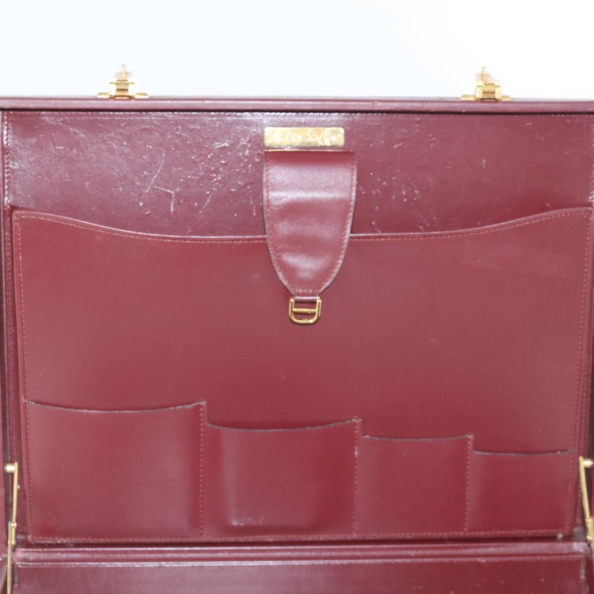 Cartier Must De Cartier Burgundy Leather Travel Bag (Pre-Owned)
