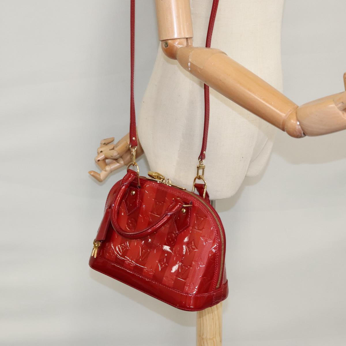 Louis Vuitton Alma Red Patent Leather Handbag (Pre-Owned)