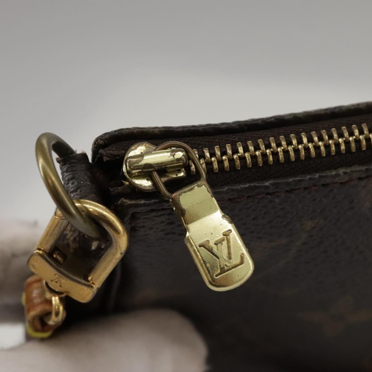 Louis Vuitton Pochette Accessoire Brown Canvas Clutch Bag (Pre-Owned)