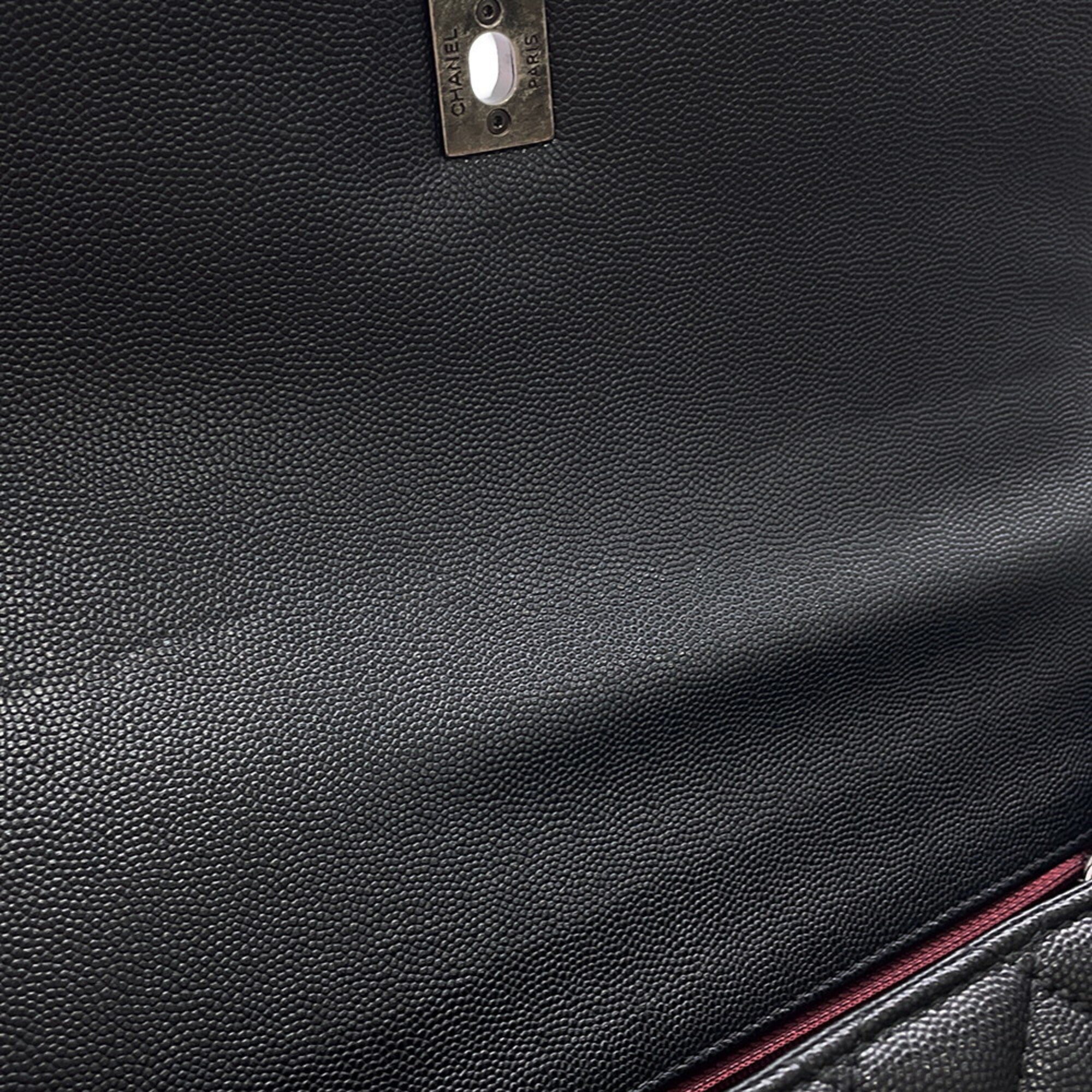 Chanel Black Grained Calfskin Handbag (Pre-Owned)