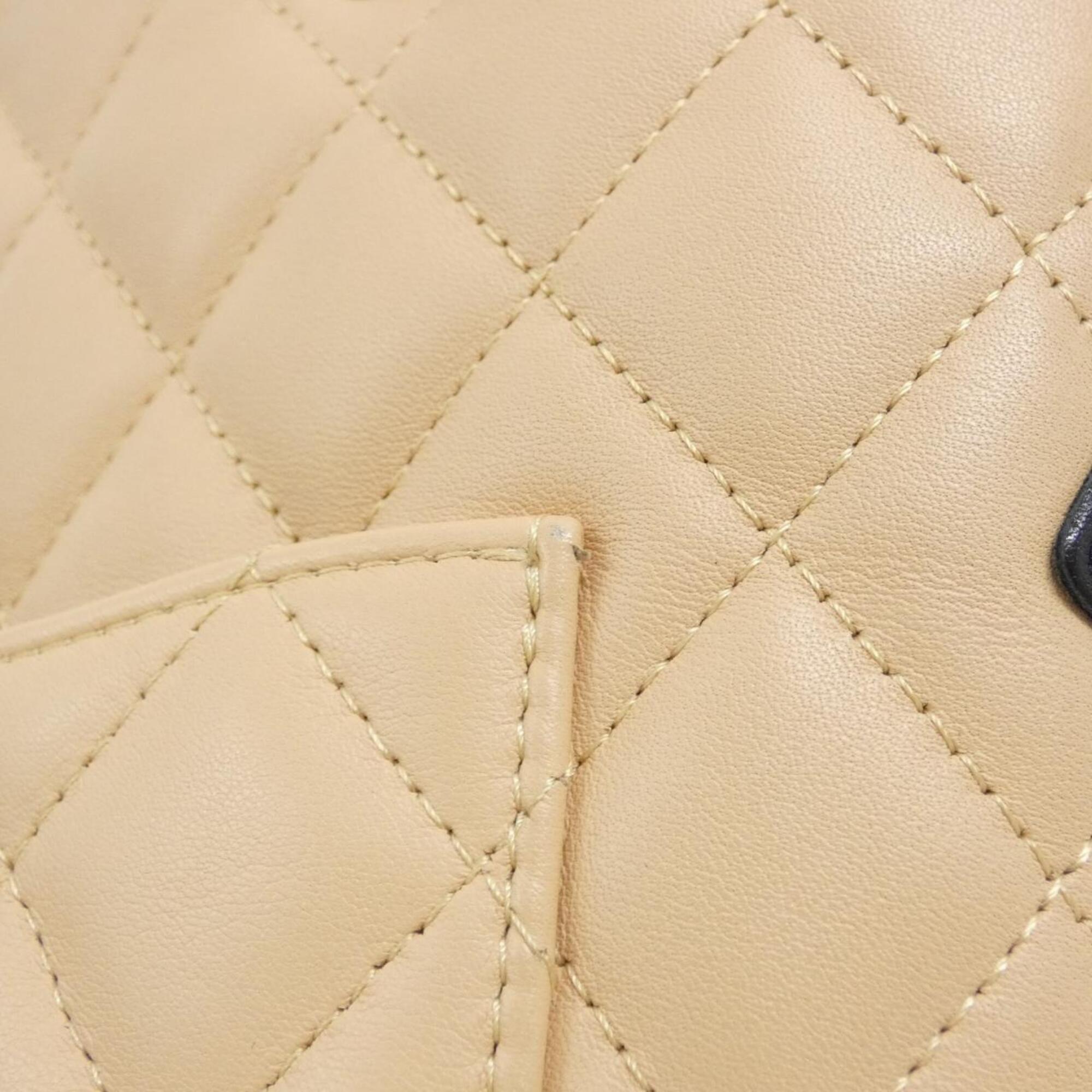 Chanel Beige Black Leather Handbag (Pre-Owned)
