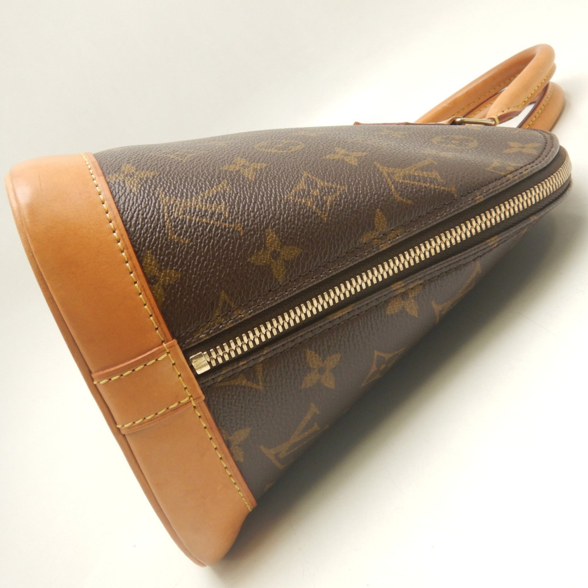 Louis Vuitton Brown Monogram Canvas Handbag (Pre-Owned)