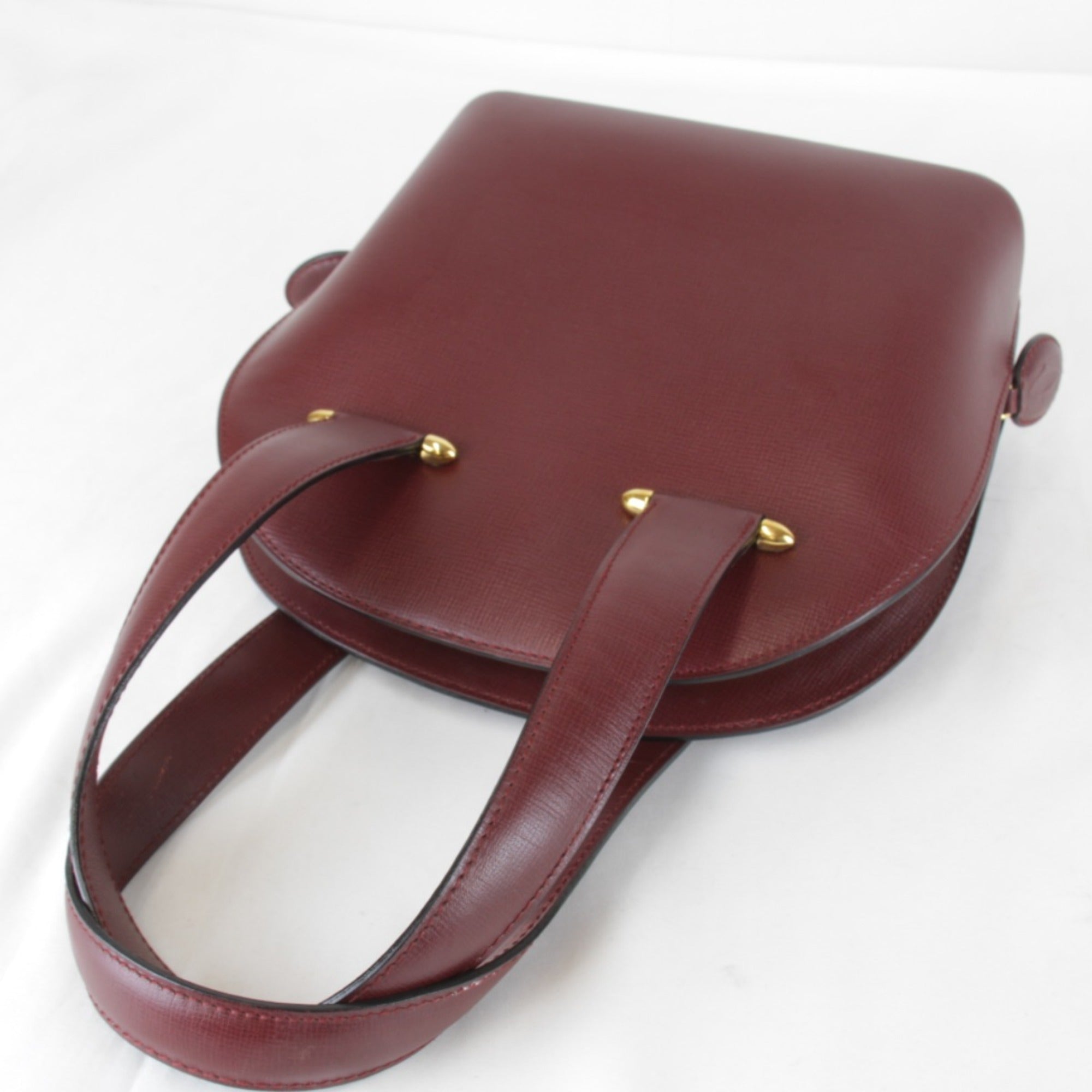 Cartier Must Wine Red Leather Handbag (Pre-Owned)