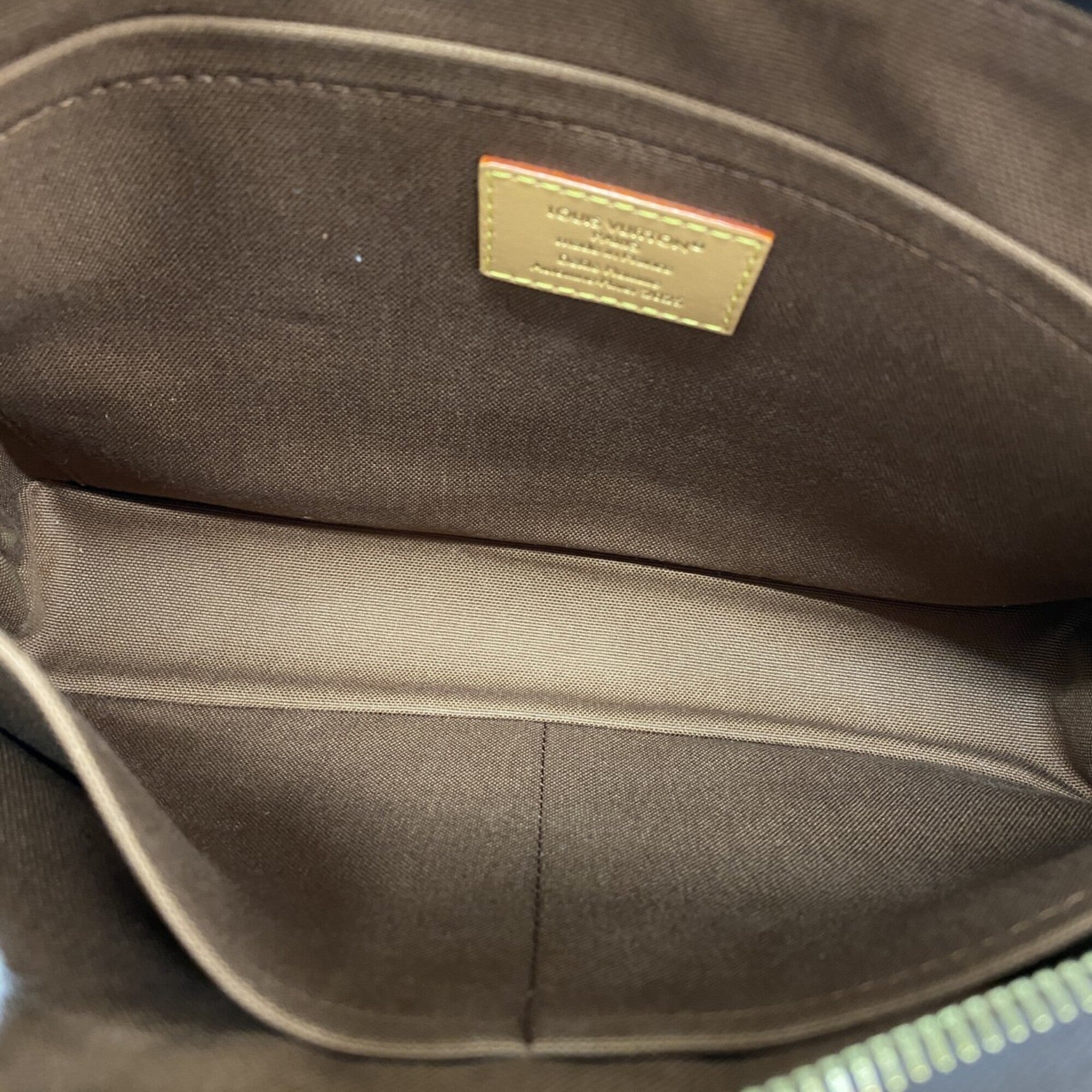 Louis Vuitton Brown Clutch Bag (Pre-Owned)