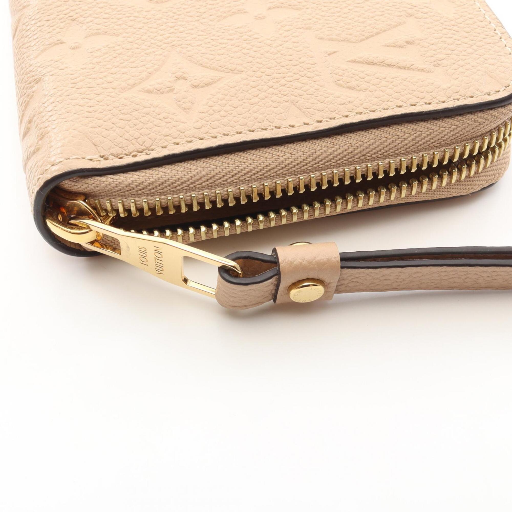 Louis Vuitton Monogram Empreinte Beige Leather Long Wallet (Bi-Fold) (Pre-Owned)