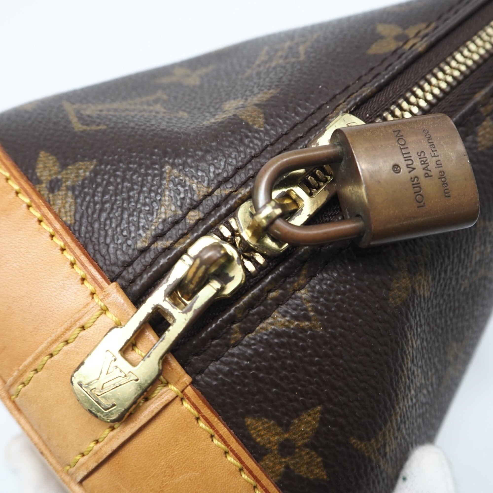 Louis Vuitton Brown Coated Canvas Leather Handbag (Pre-Owned)