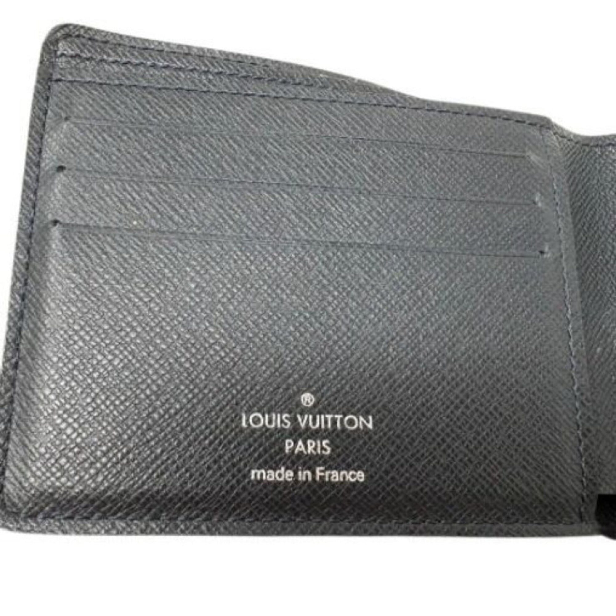 Louis Vuitton Noir Taiga Leather Wallet (Bi-Fold) (Pre-Owned)