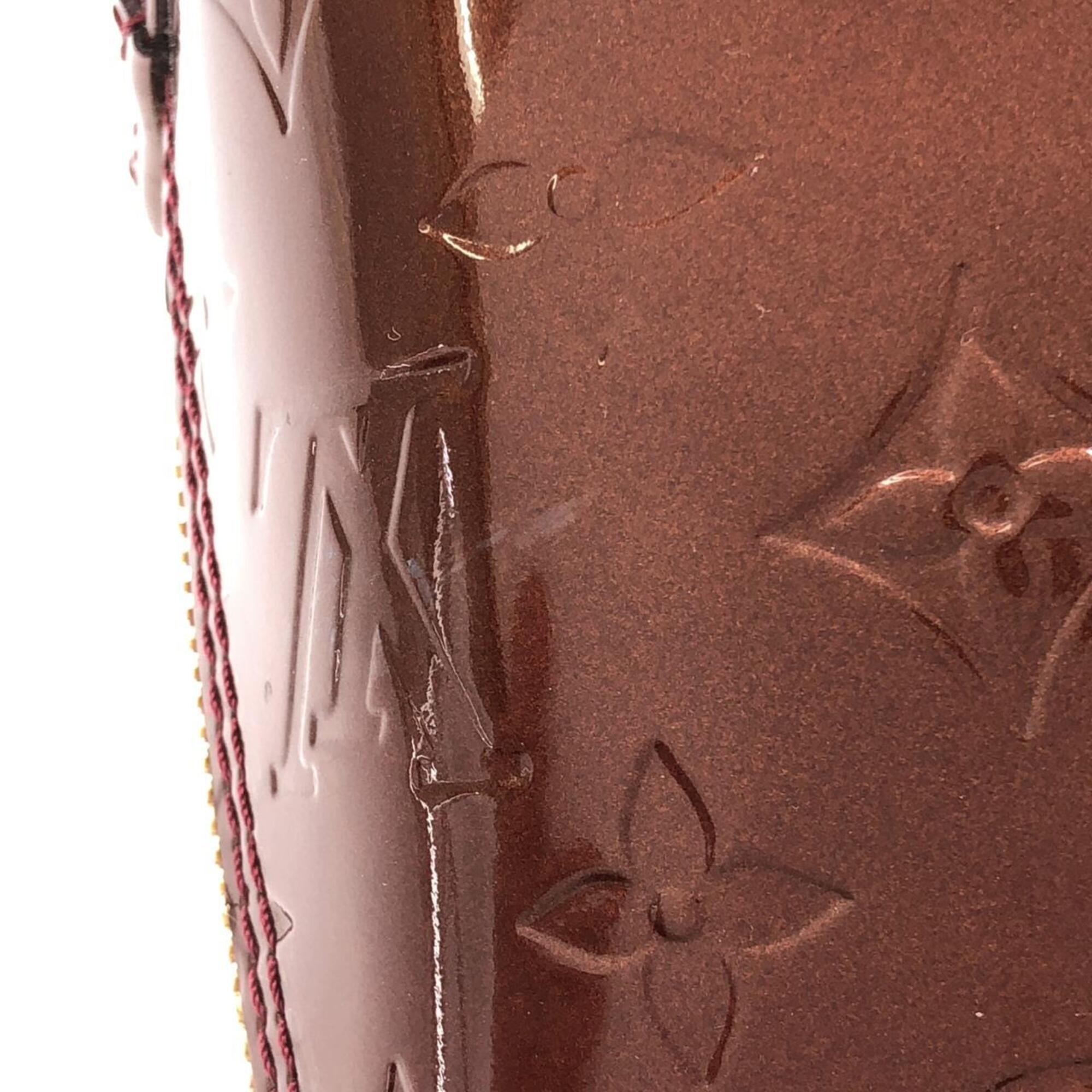 Louis Vuitton Rouge Fauviste Leather Handbag (Pre-Owned)