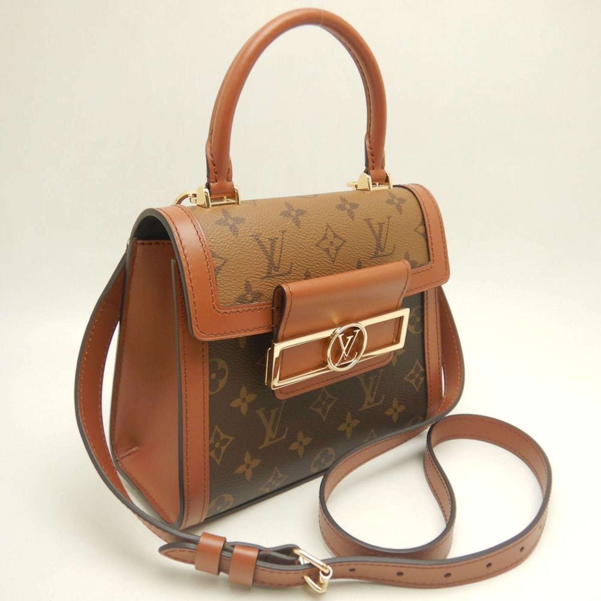 Louis Vuitton Monogram Reverse Brown Pvc Leather Handbag (Pre-Owned)