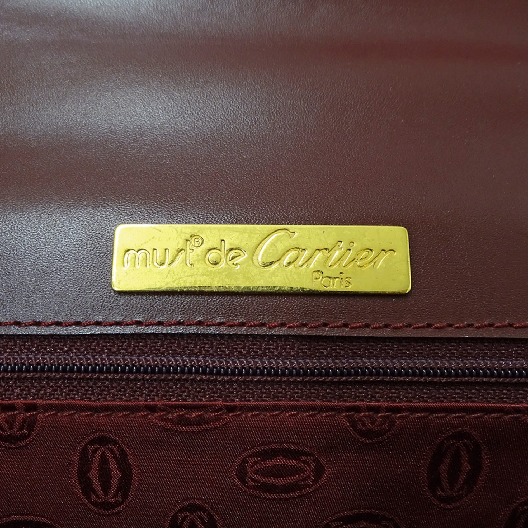 Cartier Bordeaux Red Color Wine Red Leather Handbag (Pre-Owned)