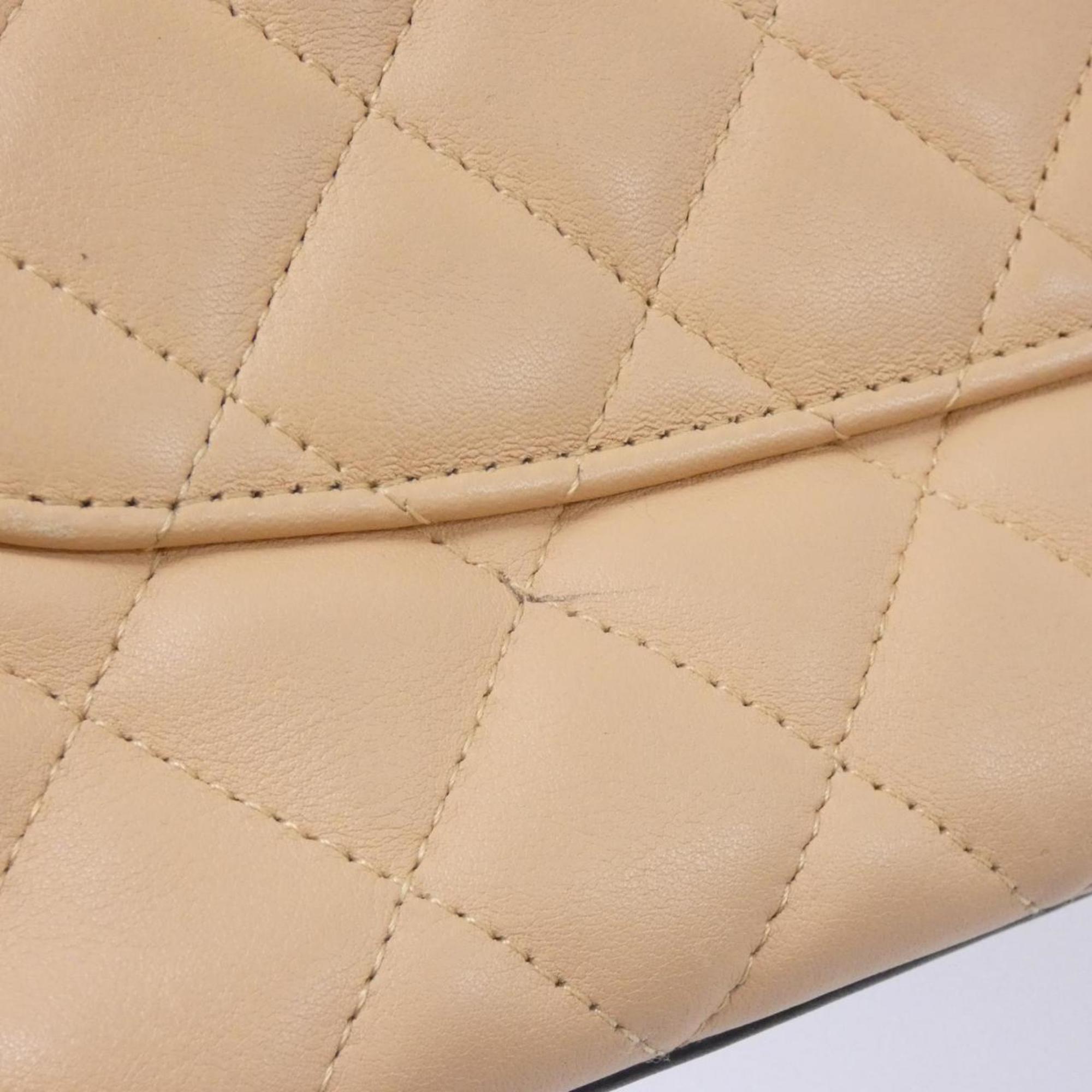 Chanel Beige Black Leather Handbag (Pre-Owned)