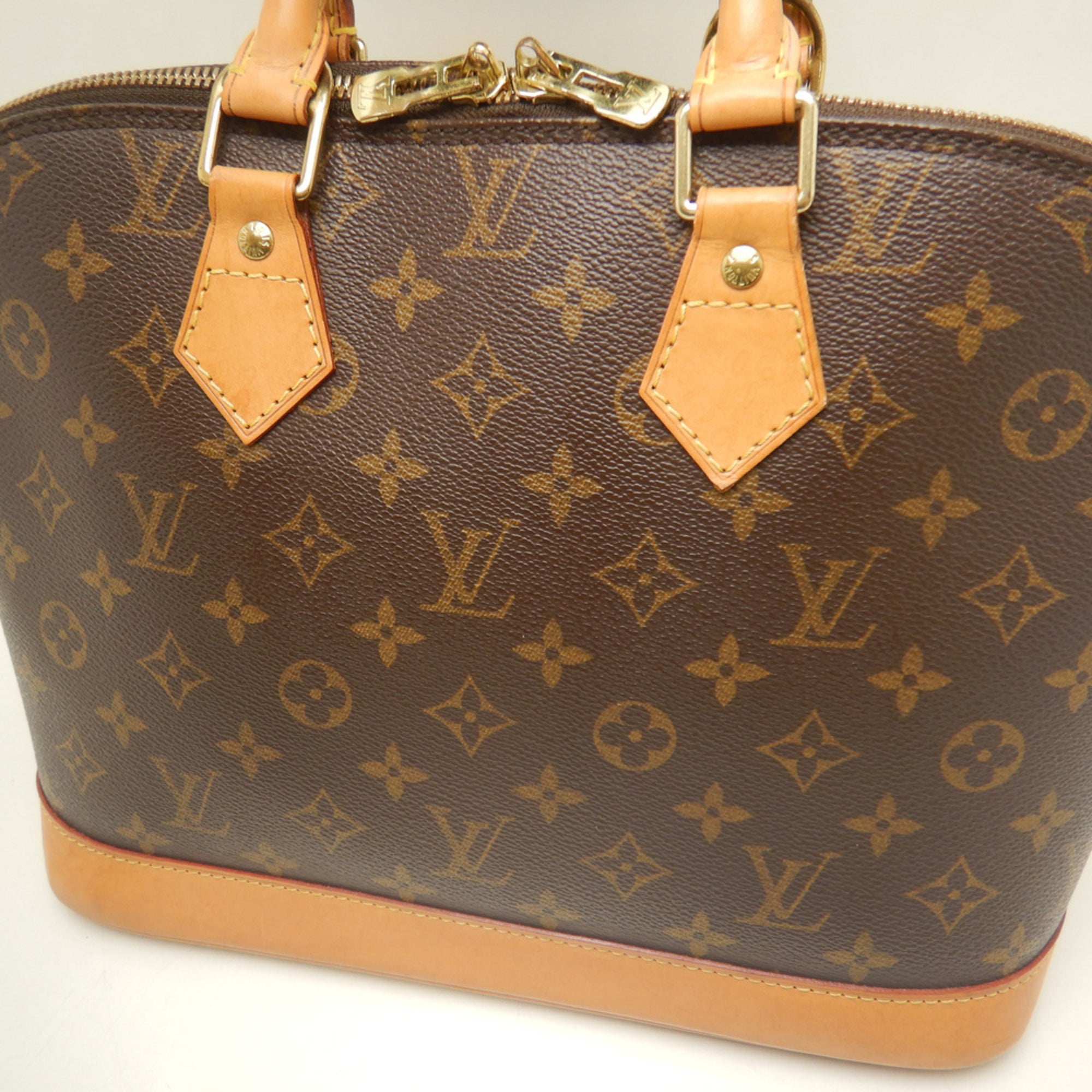 Louis Vuitton Brown Monogram Canvas Handbag (Pre-Owned)