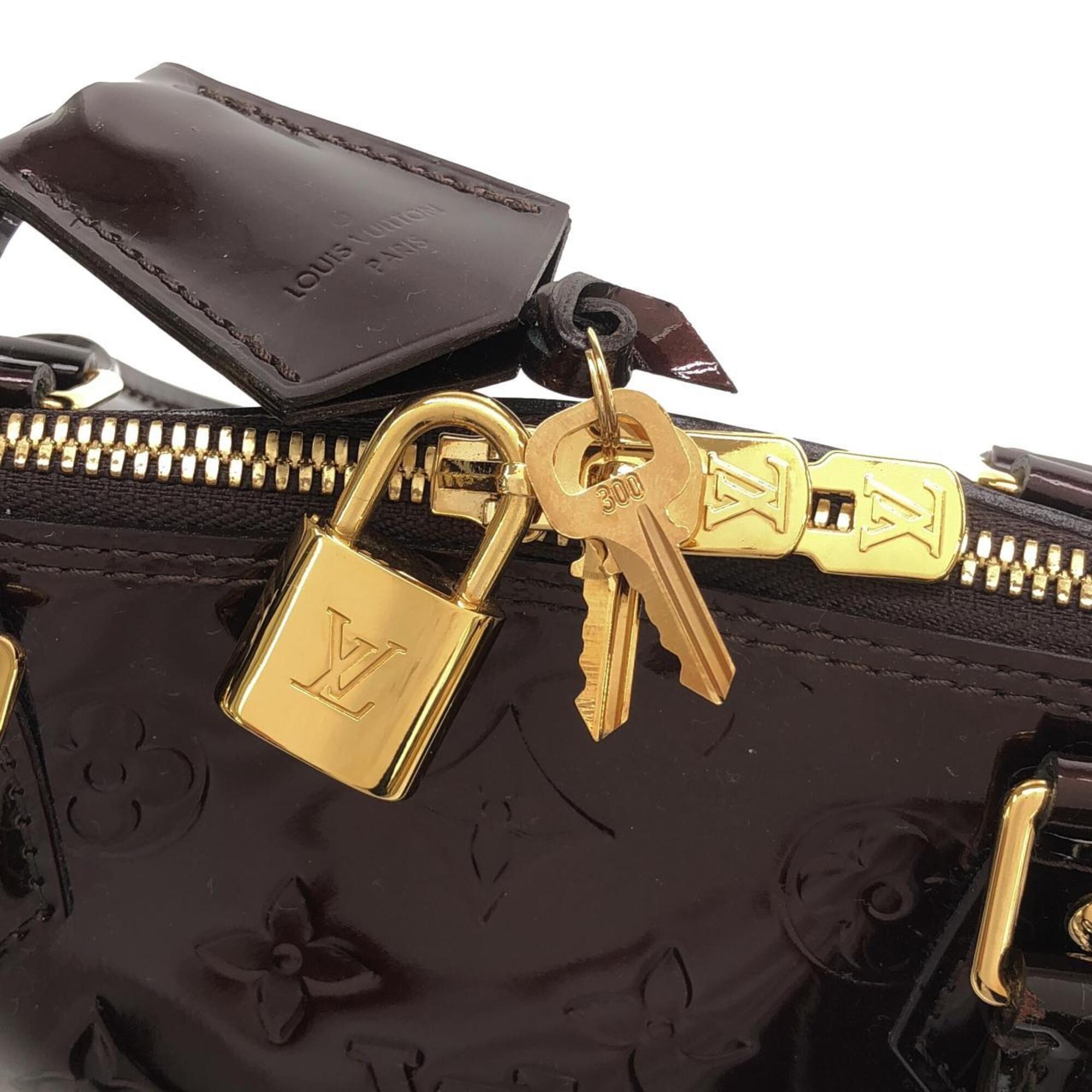 Louis Vuitton Amarante Leather Handbag (Pre-Owned)