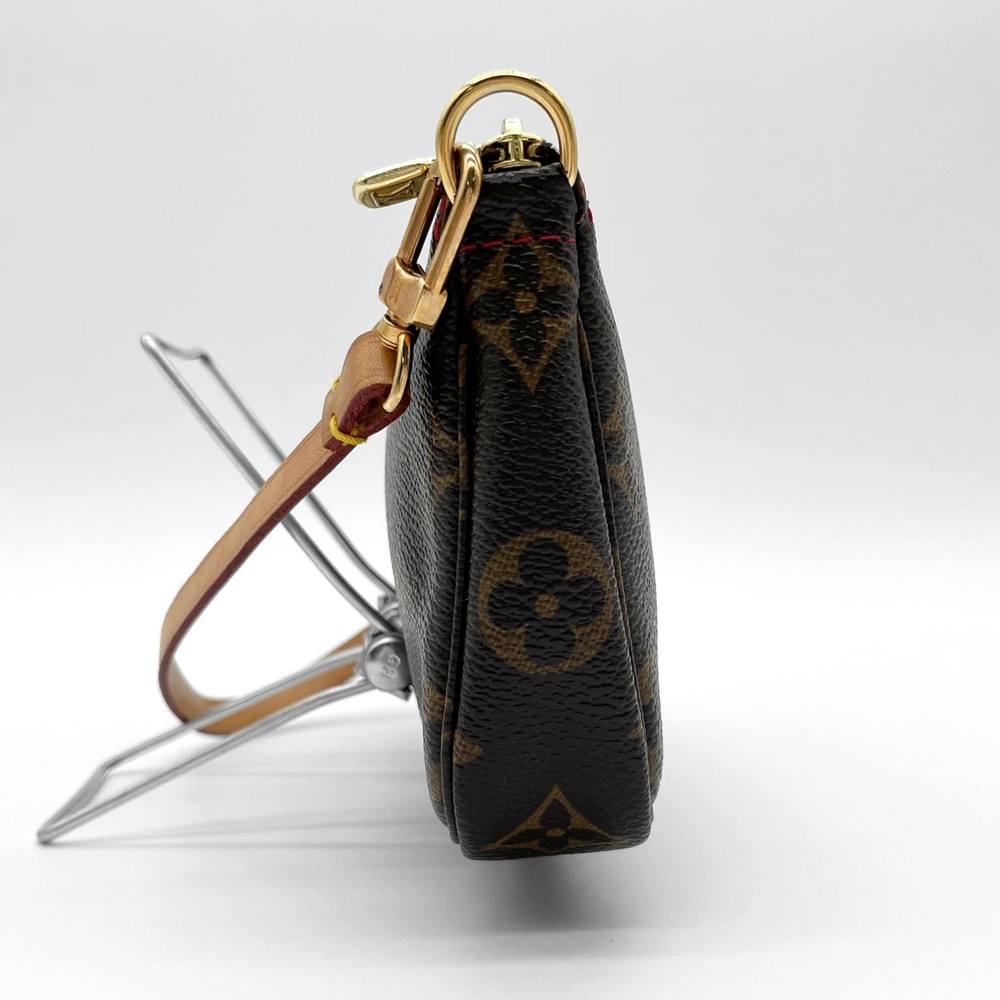 Louis Vuitton Brown Coated Canvas Pvc Handbag (Pre-Owned)