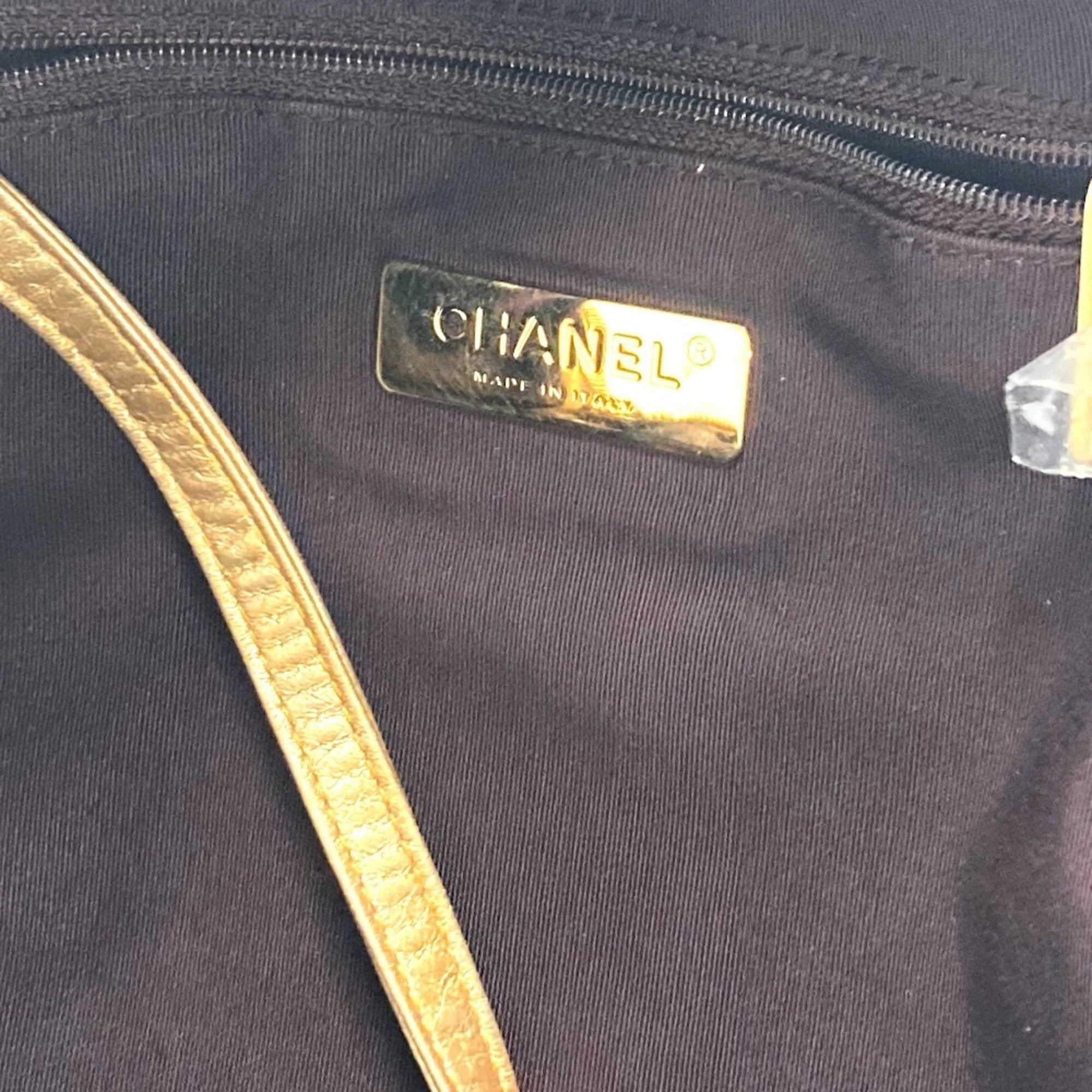 Chanel Gold Leather Canvas Backpack (Pre-Owned)