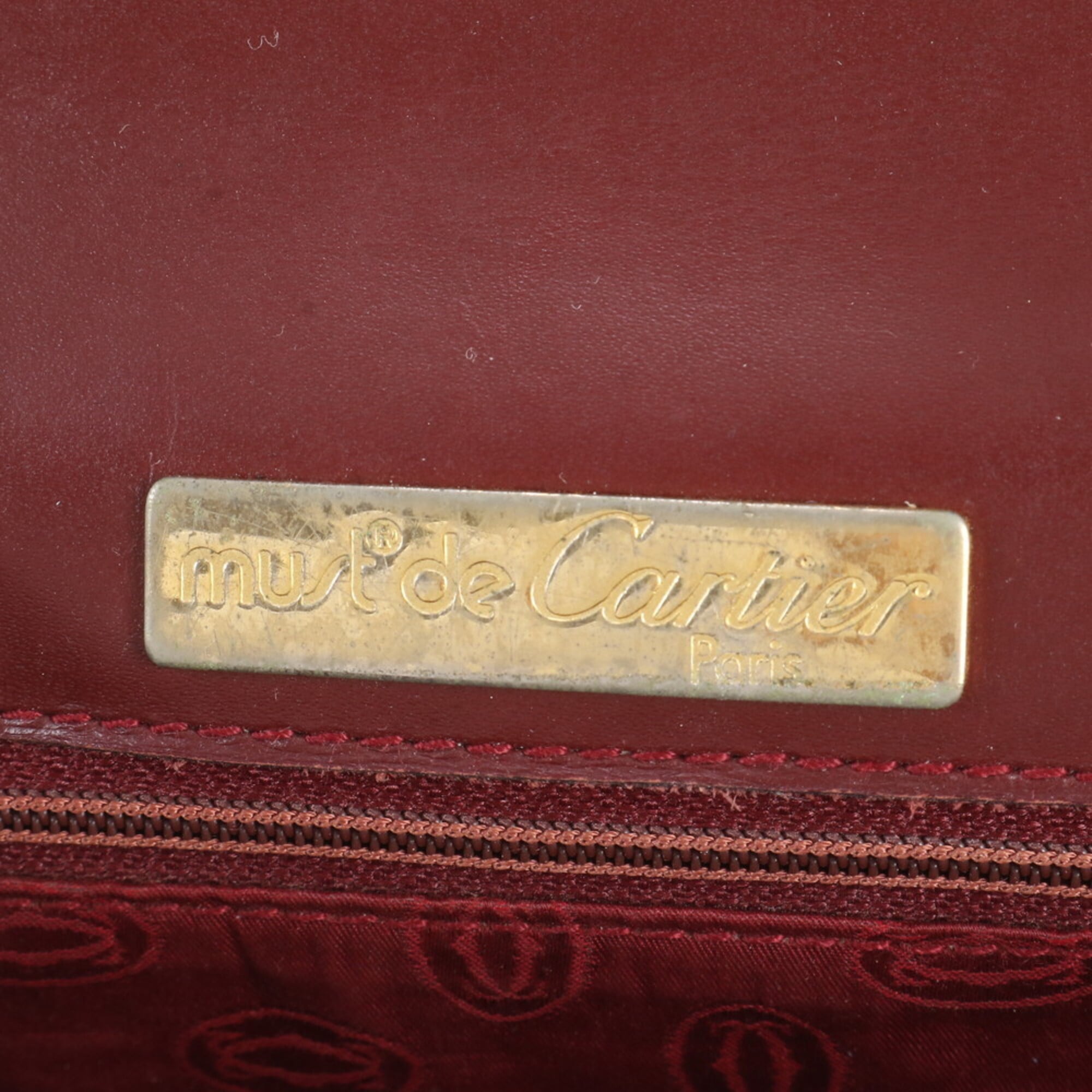 Cartier Wine Red Leather Handbag (Pre-Owned)