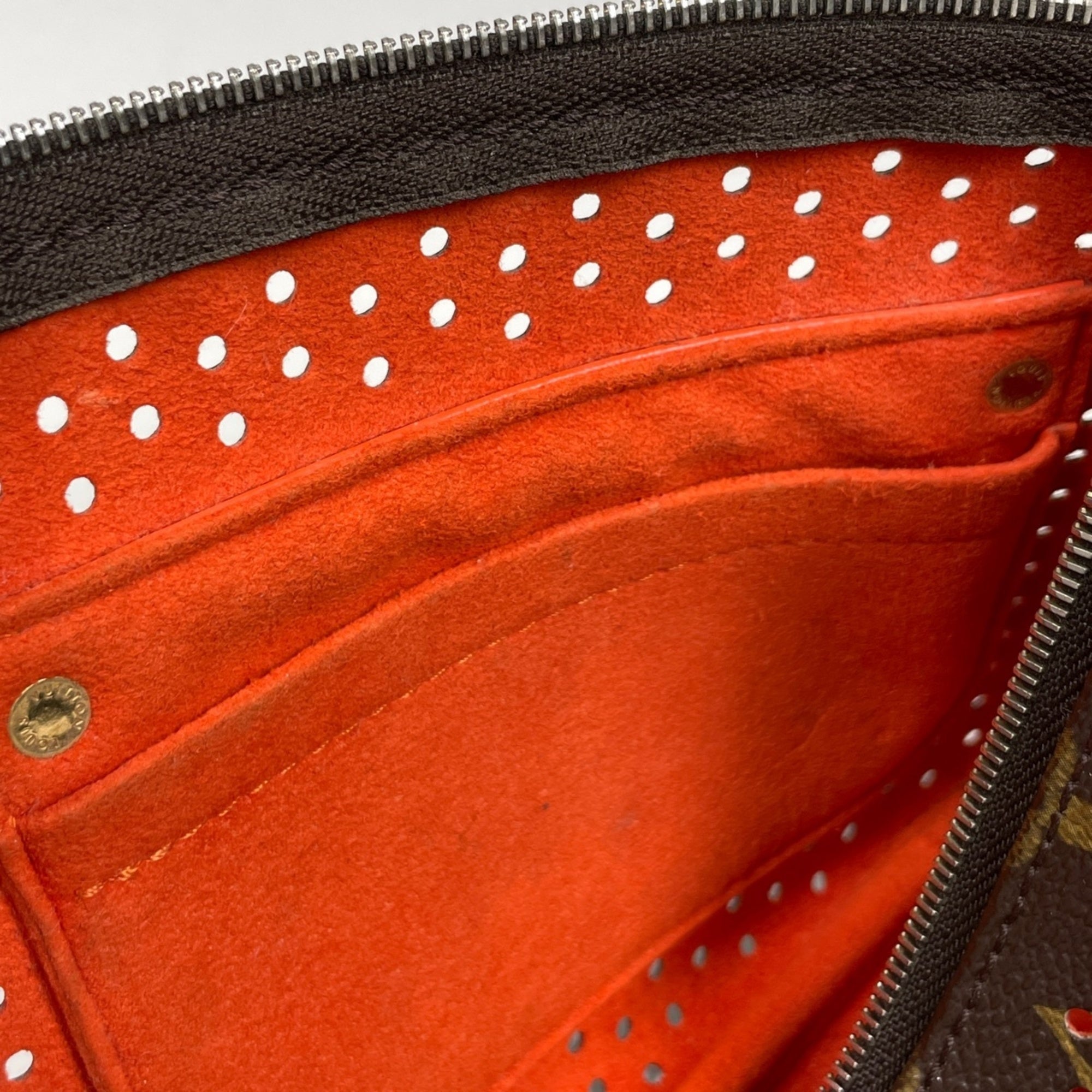 Louis Vuitton Monogram Perfo Lv Orange Orange Monogram Perforated Handbag Pochette (Pre-Owned)