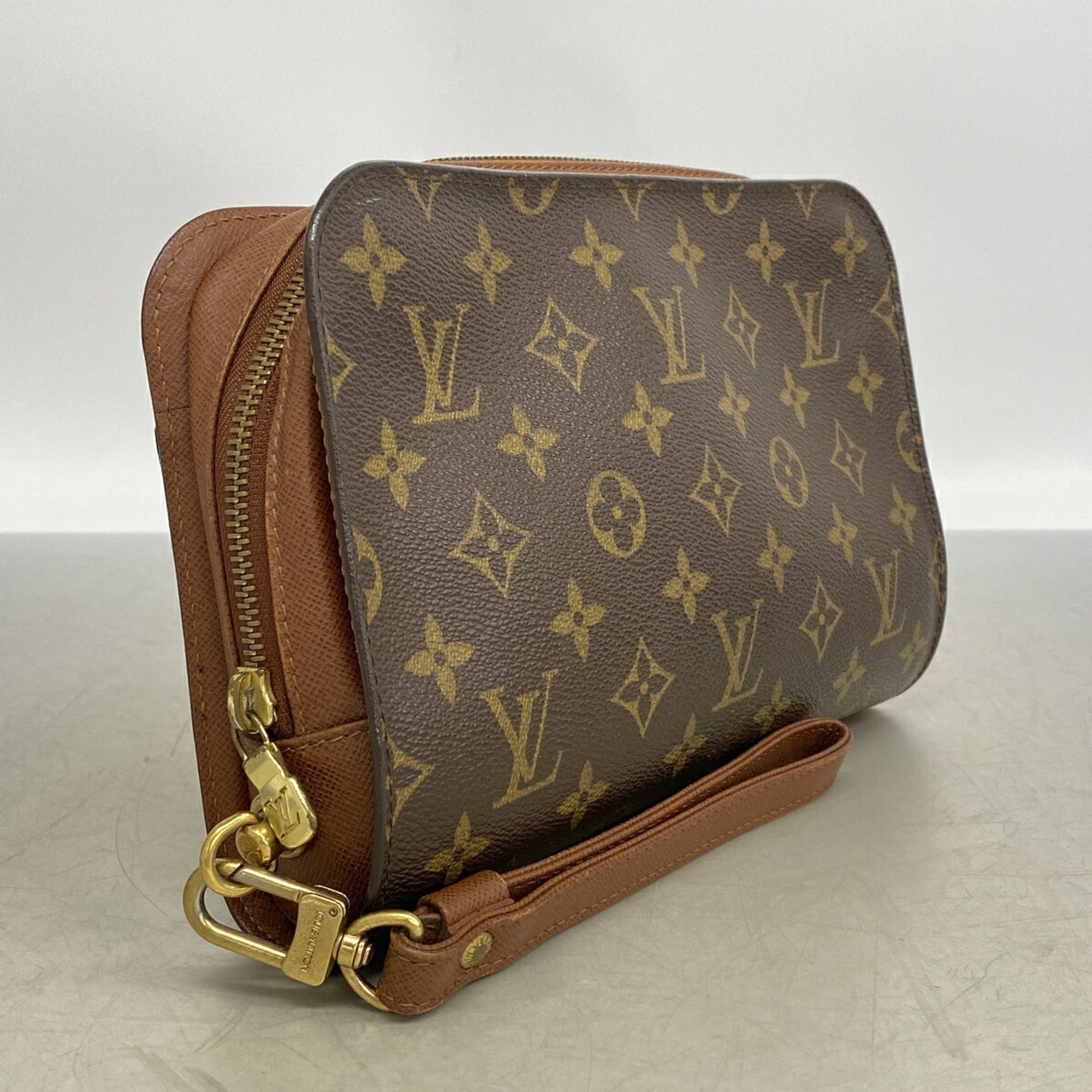 Louis Vuitton Brown Clutch Bag (Pre-Owned)