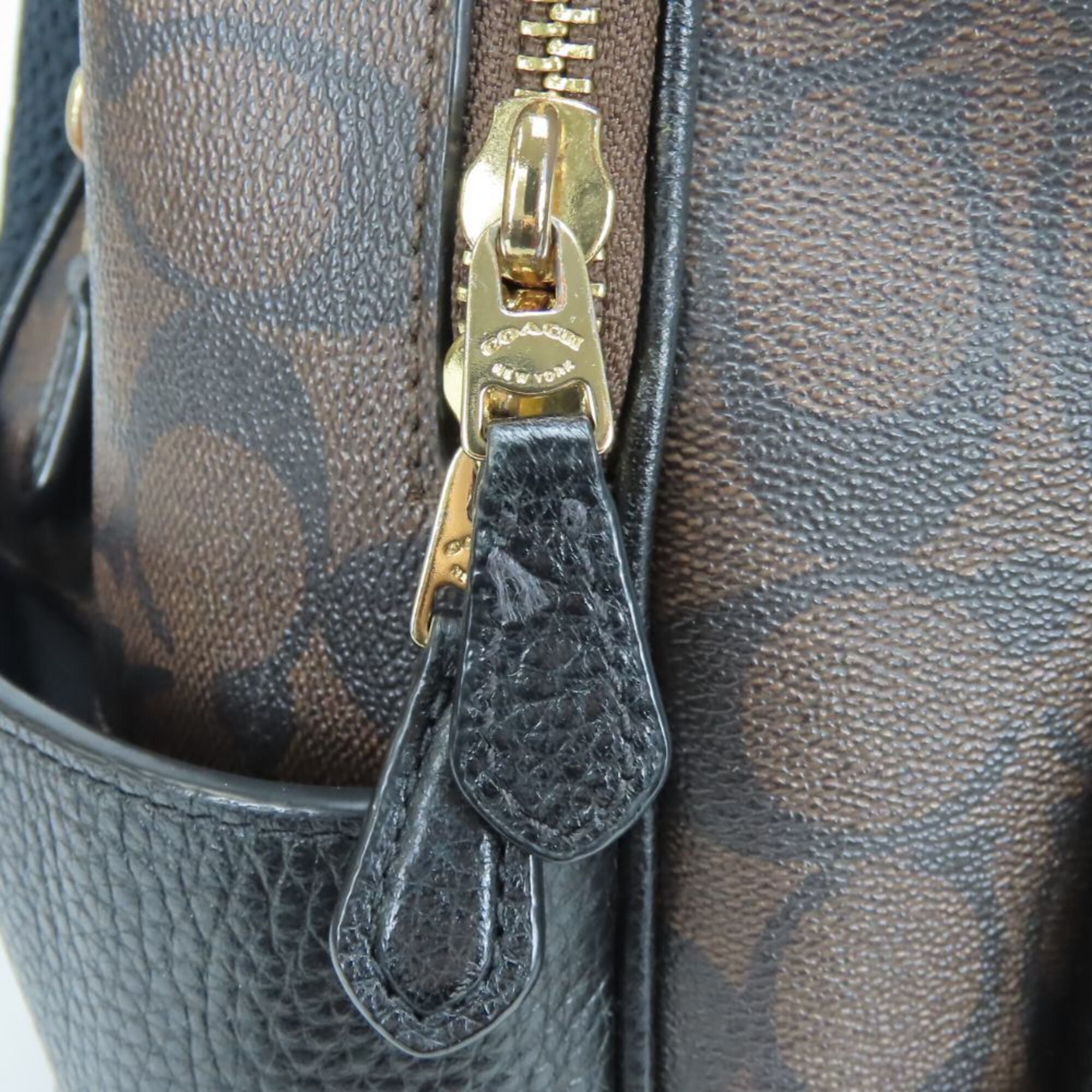 Coach Signature Black Dark Brown Pvc Leather Backpack (Pre-Owned)