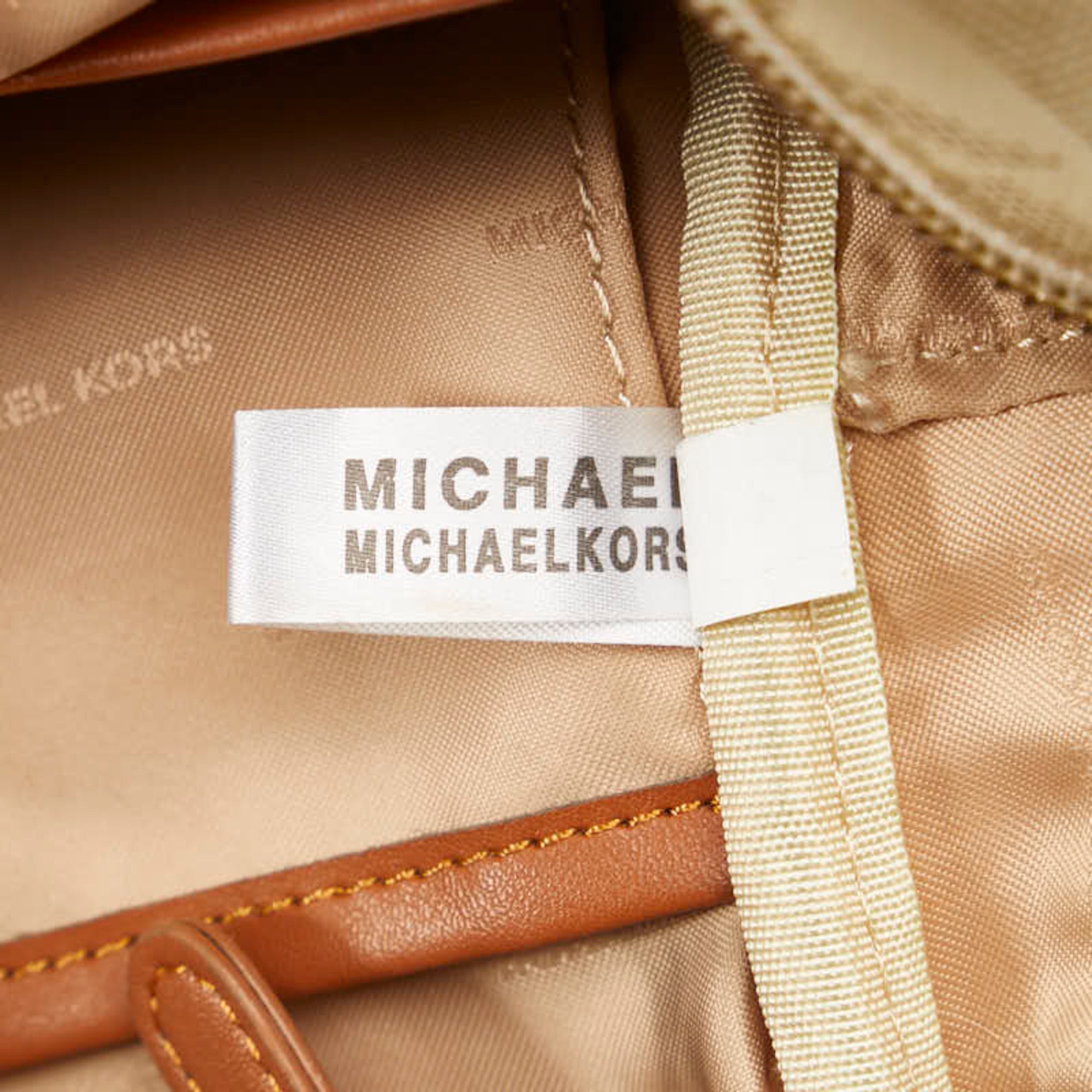 Michael Kors Brown White Pvc Leather Backpack (Pre-Owned)