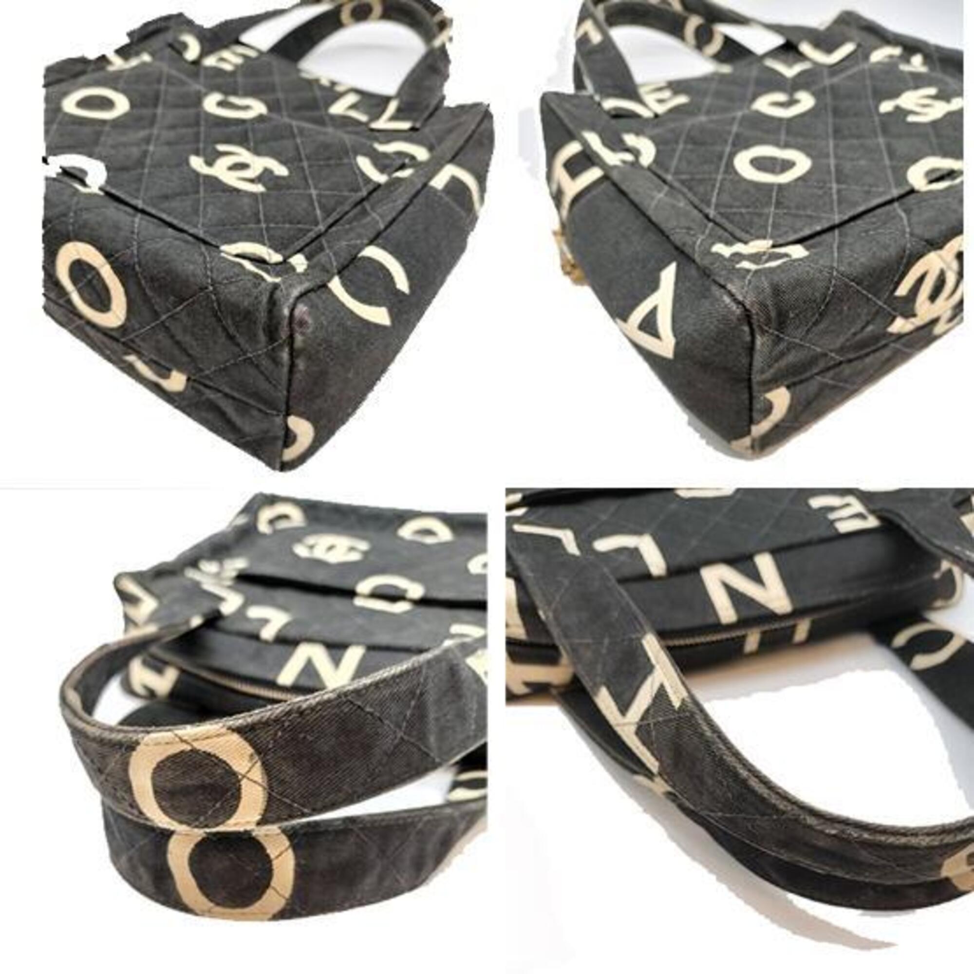 Chanel Black White Canvas Handbag (Pre-Owned)